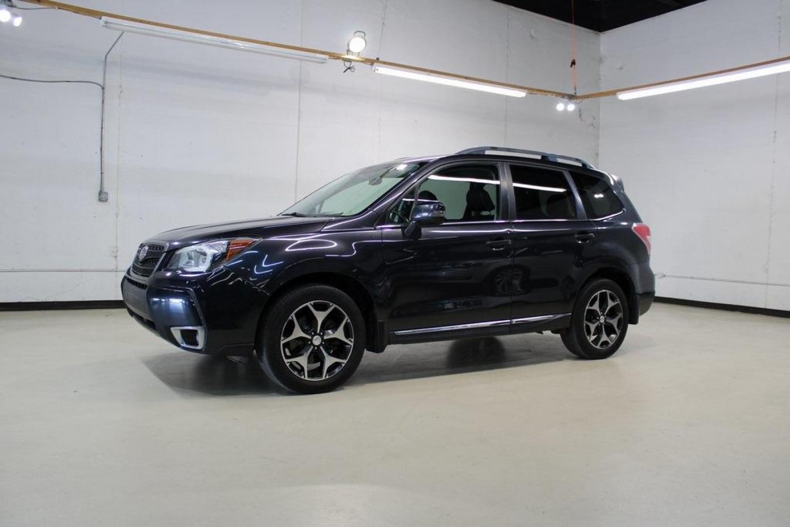 2016 Dark Gray Metallic /Black Subaru Forester 2.0XT Touring (JF2SJGXC6GH) with an 2.0L 4-Cylinder DOHC 16V Turbocharged Intercooled engine, CVT transmission, located at 15300 Midway Rd., Addison, TX, 75001, (972) 702-0011, 32.958321, -96.838074 - Introducing the 2016 Subaru Forester 2.5i Touring, now available at Midway Auto Group in Addison, Texas. This versatile SUV combines Subaru's renowned all-wheel-drive capability with a suite of premium features, making it an excellent choice for both urban commutes and outdoor adventures.<br><br>Key - Photo#4