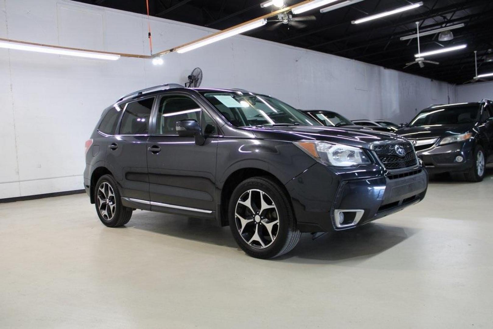 2016 Dark Gray Metallic /Black Subaru Forester 2.0XT Touring (JF2SJGXC6GH) with an 2.0L 4-Cylinder DOHC 16V Turbocharged Intercooled engine, CVT transmission, located at 15300 Midway Rd., Addison, TX, 75001, (972) 702-0011, 32.958321, -96.838074 - Introducing the 2016 Subaru Forester 2.5i Touring, now available at Midway Auto Group in Addison, Texas. This versatile SUV combines Subaru's renowned all-wheel-drive capability with a suite of premium features, making it an excellent choice for both urban commutes and outdoor adventures.<br><br>Key - Photo#6