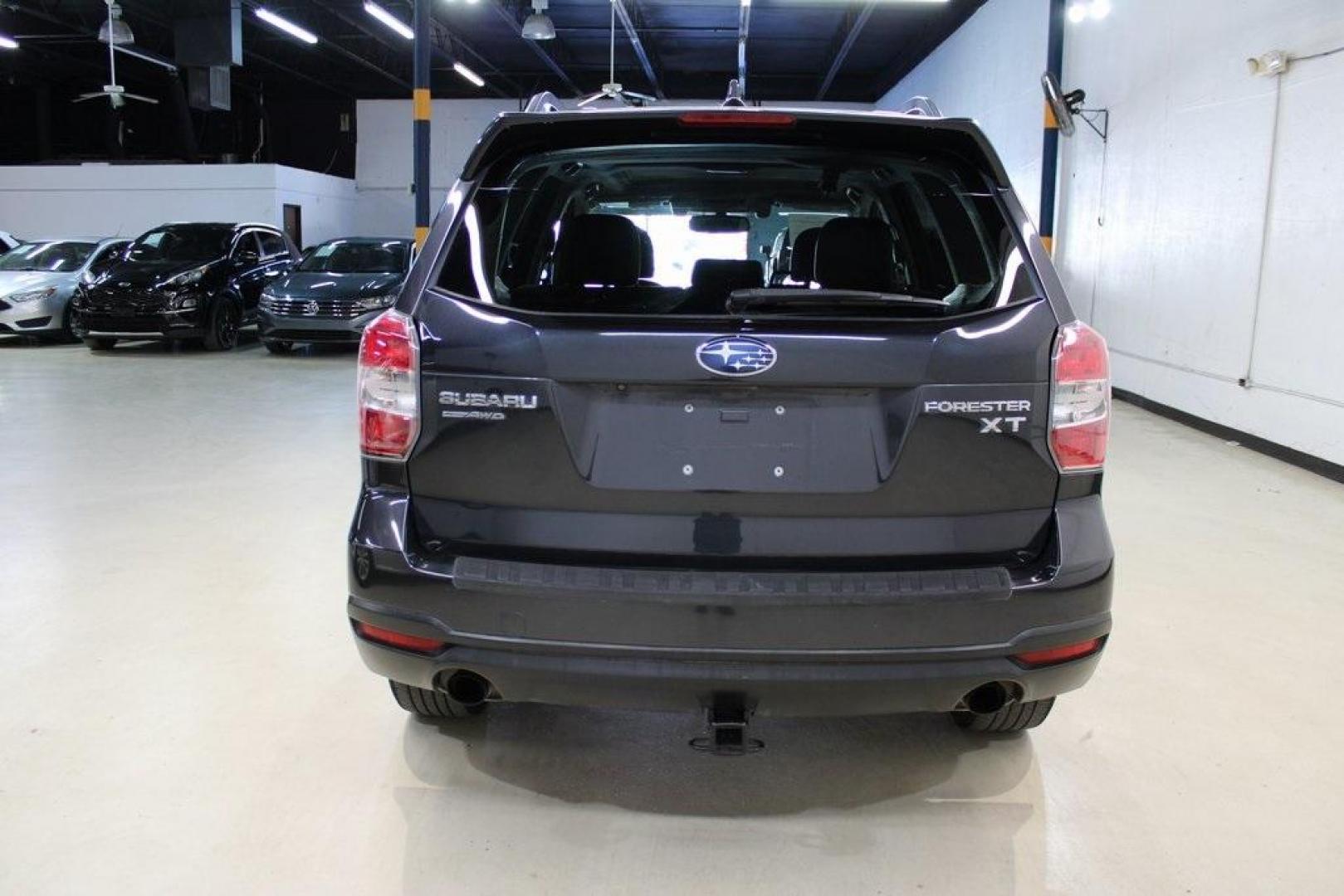 2016 Dark Gray Metallic /Black Subaru Forester 2.0XT Touring (JF2SJGXC6GH) with an 2.0L 4-Cylinder DOHC 16V Turbocharged Intercooled engine, CVT transmission, located at 15300 Midway Rd., Addison, TX, 75001, (972) 702-0011, 32.958321, -96.838074 - Introducing the 2016 Subaru Forester 2.5i Touring, now available at Midway Auto Group in Addison, Texas. This versatile SUV combines Subaru's renowned all-wheel-drive capability with a suite of premium features, making it an excellent choice for both urban commutes and outdoor adventures.<br><br>Key - Photo#7