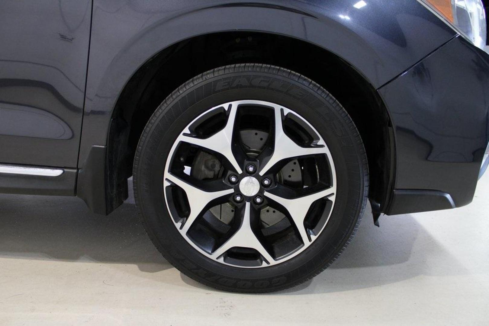 2016 Dark Gray Metallic /Black Subaru Forester 2.0XT Touring (JF2SJGXC6GH) with an 2.0L 4-Cylinder DOHC 16V Turbocharged Intercooled engine, CVT transmission, located at 15300 Midway Rd., Addison, TX, 75001, (972) 702-0011, 32.958321, -96.838074 - Introducing the 2016 Subaru Forester 2.5i Touring, now available at Midway Auto Group in Addison, Texas. This versatile SUV combines Subaru's renowned all-wheel-drive capability with a suite of premium features, making it an excellent choice for both urban commutes and outdoor adventures.<br><br>Key - Photo#11