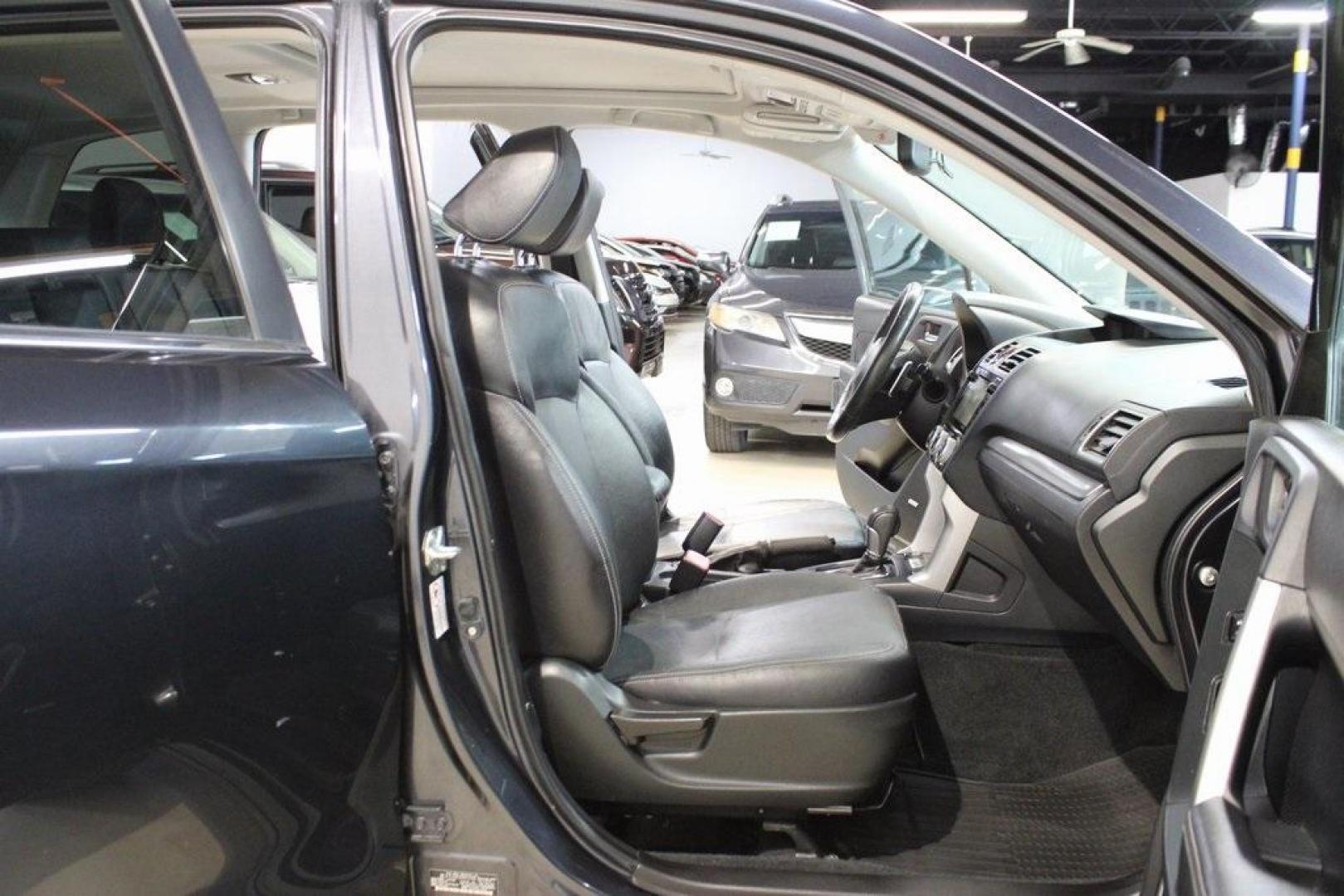 2016 Dark Gray Metallic /Black Subaru Forester 2.0XT Touring (JF2SJGXC6GH) with an 2.0L 4-Cylinder DOHC 16V Turbocharged Intercooled engine, CVT transmission, located at 15300 Midway Rd., Addison, TX, 75001, (972) 702-0011, 32.958321, -96.838074 - Introducing the 2016 Subaru Forester 2.5i Touring, now available at Midway Auto Group in Addison, Texas. This versatile SUV combines Subaru's renowned all-wheel-drive capability with a suite of premium features, making it an excellent choice for both urban commutes and outdoor adventures.<br><br>Key - Photo#15