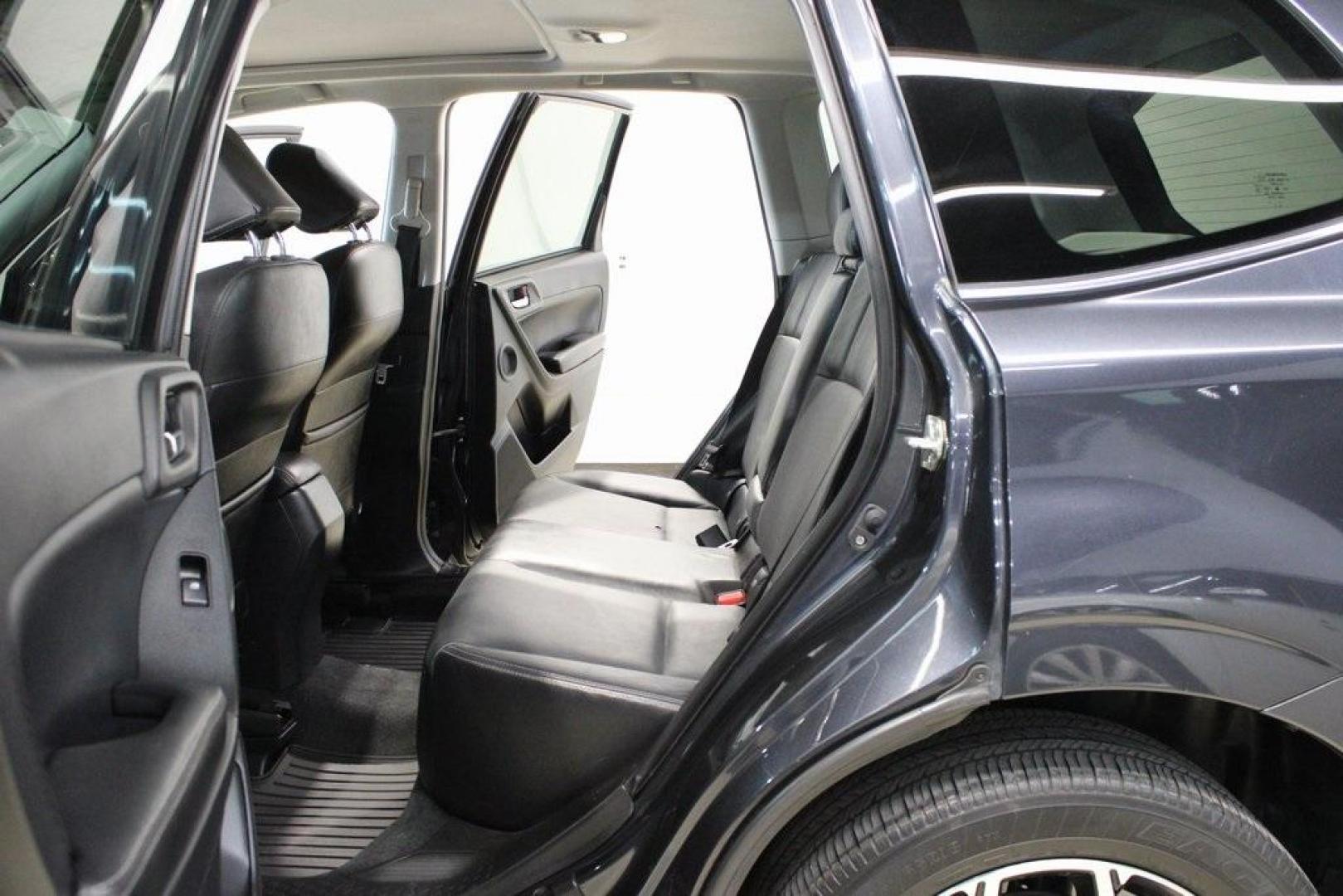 2016 Dark Gray Metallic /Black Subaru Forester 2.0XT Touring (JF2SJGXC6GH) with an 2.0L 4-Cylinder DOHC 16V Turbocharged Intercooled engine, CVT transmission, located at 15300 Midway Rd., Addison, TX, 75001, (972) 702-0011, 32.958321, -96.838074 - Introducing the 2016 Subaru Forester 2.5i Touring, now available at Midway Auto Group in Addison, Texas. This versatile SUV combines Subaru's renowned all-wheel-drive capability with a suite of premium features, making it an excellent choice for both urban commutes and outdoor adventures.<br><br>Key - Photo#17