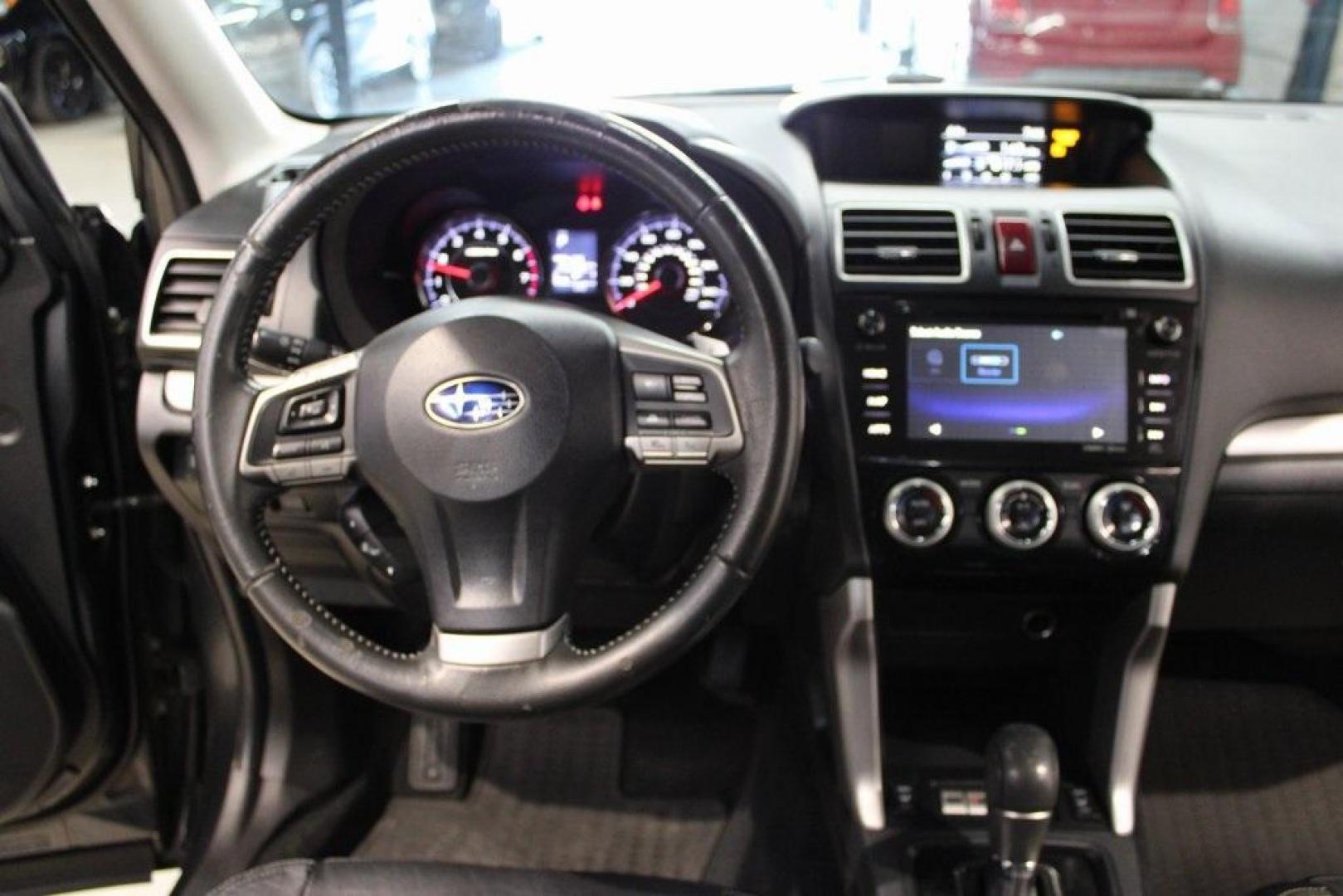 2016 Dark Gray Metallic /Black Subaru Forester 2.0XT Touring (JF2SJGXC6GH) with an 2.0L 4-Cylinder DOHC 16V Turbocharged Intercooled engine, CVT transmission, located at 15300 Midway Rd., Addison, TX, 75001, (972) 702-0011, 32.958321, -96.838074 - Introducing the 2016 Subaru Forester 2.5i Touring, now available at Midway Auto Group in Addison, Texas. This versatile SUV combines Subaru's renowned all-wheel-drive capability with a suite of premium features, making it an excellent choice for both urban commutes and outdoor adventures.<br><br>Key - Photo#18