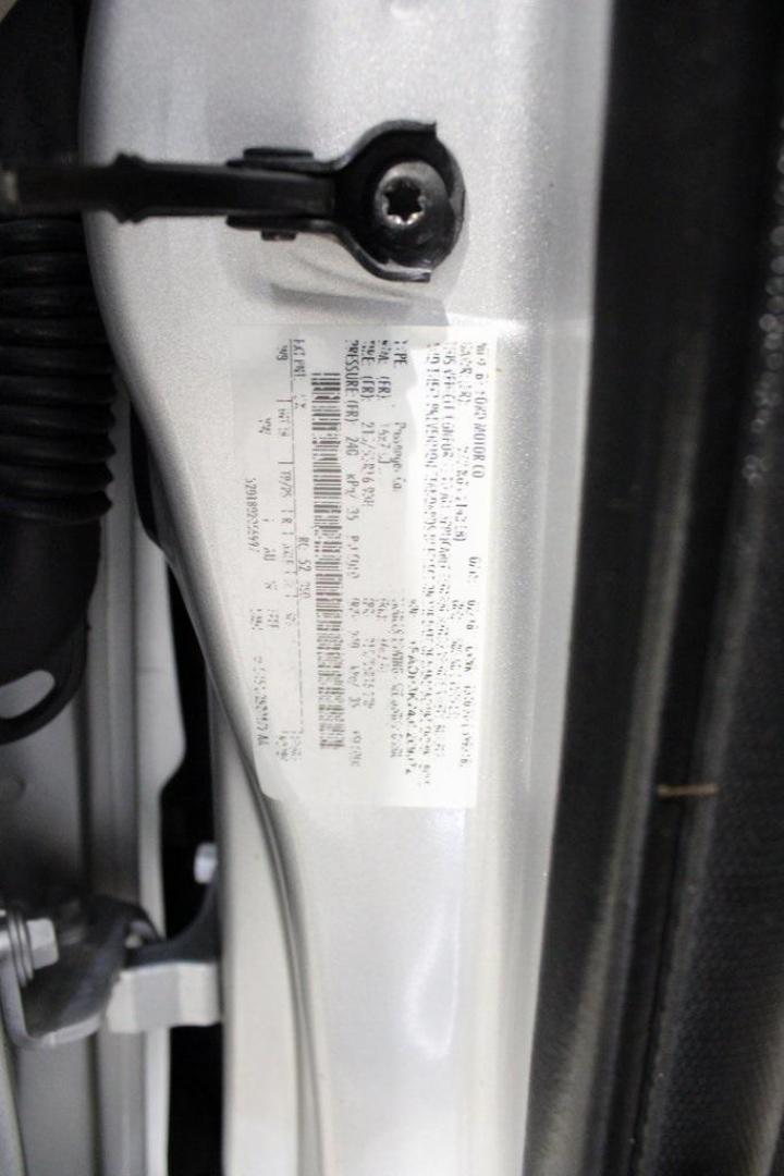 2018 Ingot Silver /Charcoal Black Ford Focus SE (1FADP3K24JL) with an 2.0L I4 DGI Ti-VCT engine, Automatic transmission, located at 15300 Midway Rd., Addison, TX, 75001, (972) 702-0011, 32.958321, -96.838074 - Photo#27