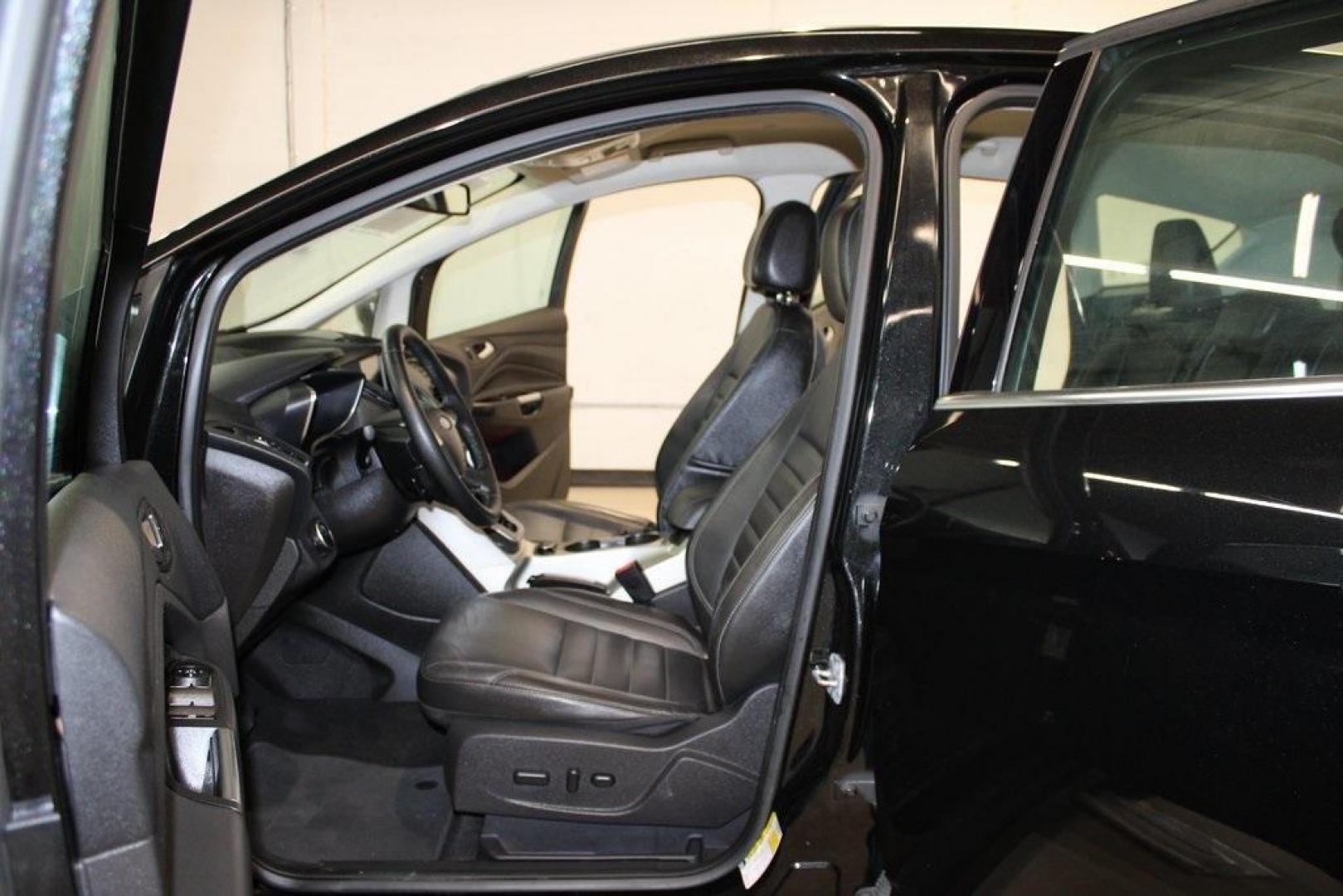 2015 Tuxedo Black /Black Ford C-Max Energi SEL (1FADP5CU7FL) with an I4 Hybrid engine, CVT transmission, located at 15300 Midway Rd., Addison, TX, 75001, (972) 702-0011, 32.958321, -96.838074 - Photo#15