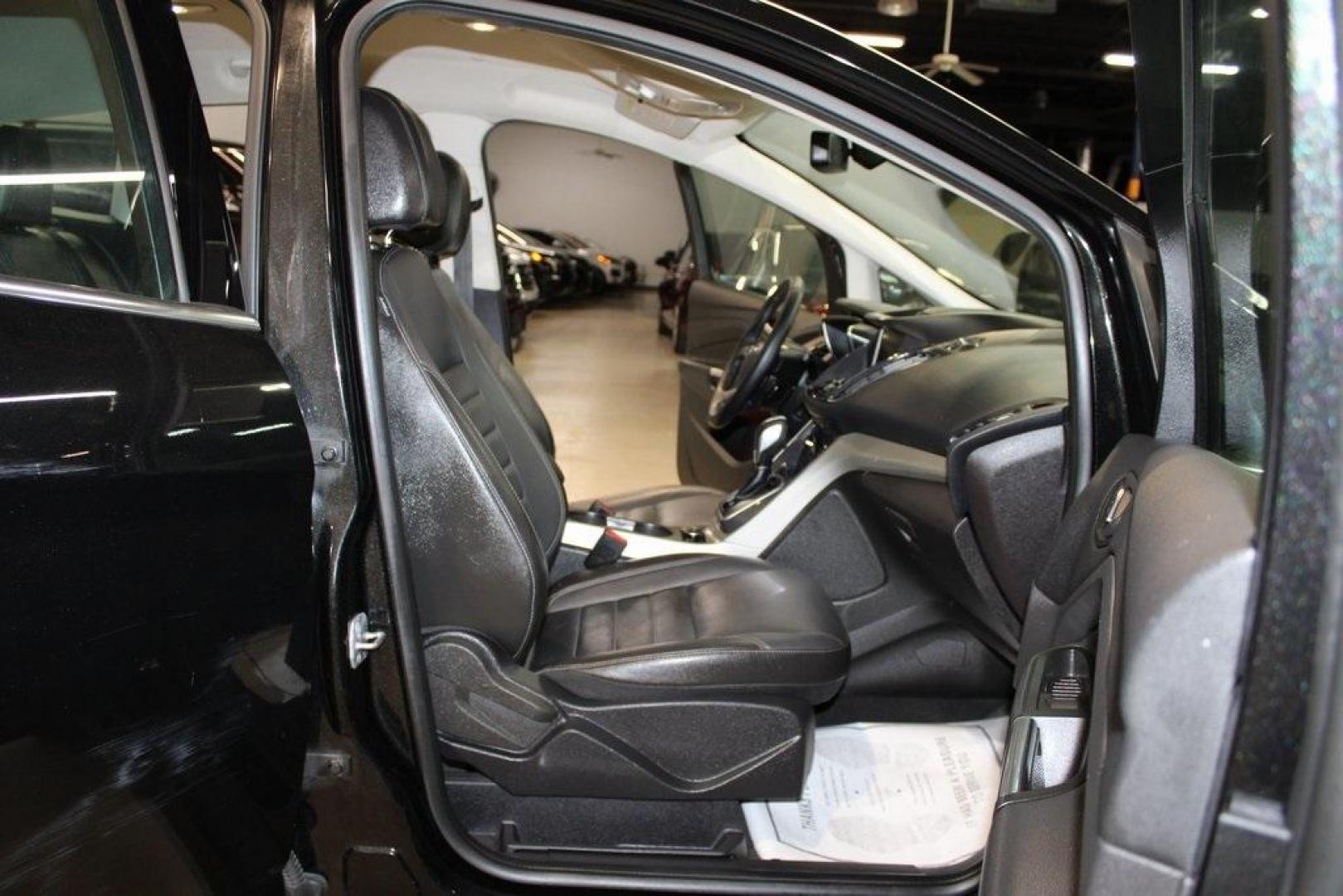 2015 Tuxedo Black /Black Ford C-Max Energi SEL (1FADP5CU7FL) with an I4 Hybrid engine, CVT transmission, located at 15300 Midway Rd., Addison, TX, 75001, (972) 702-0011, 32.958321, -96.838074 - Photo#16