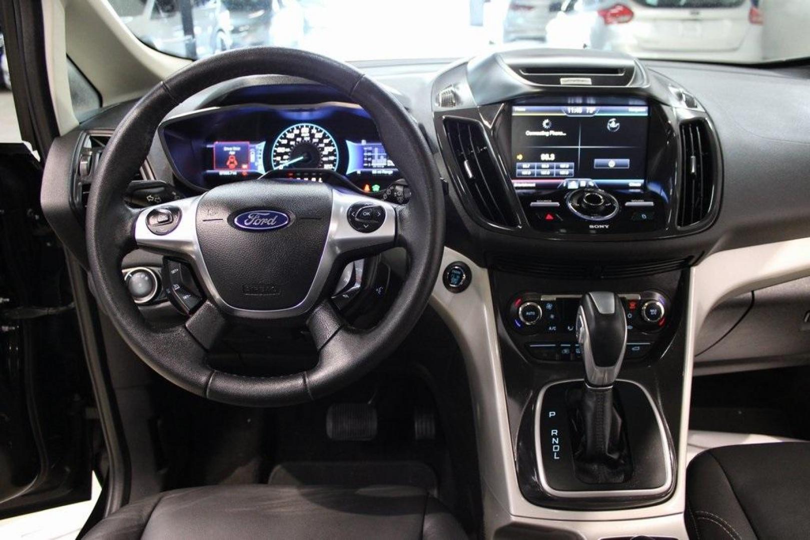2015 Tuxedo Black /Black Ford C-Max Energi SEL (1FADP5CU7FL) with an I4 Hybrid engine, CVT transmission, located at 15300 Midway Rd., Addison, TX, 75001, (972) 702-0011, 32.958321, -96.838074 - Photo#19