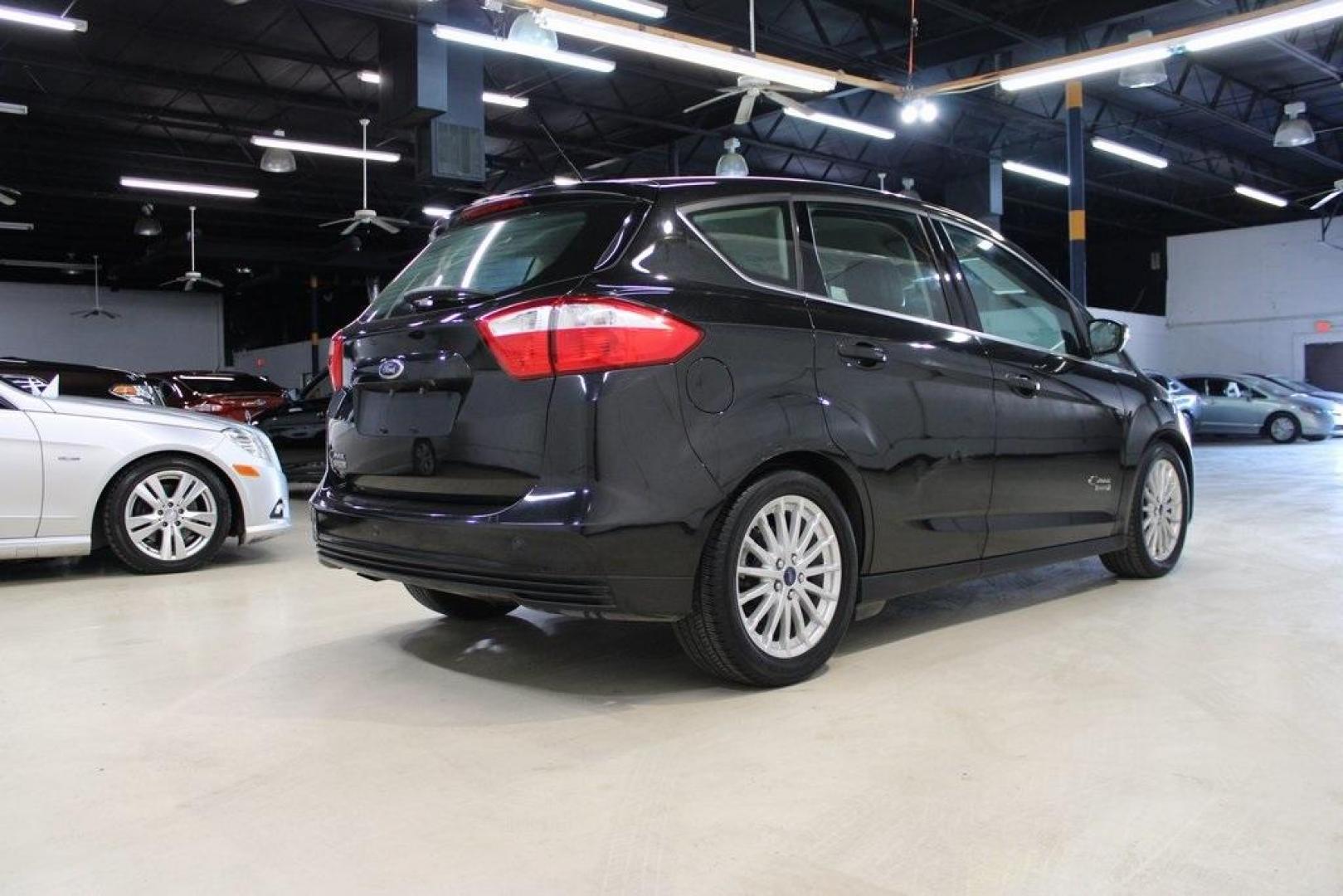 2015 Tuxedo Black /Black Ford C-Max Energi SEL (1FADP5CU7FL) with an I4 Hybrid engine, CVT transmission, located at 15300 Midway Rd., Addison, TX, 75001, (972) 702-0011, 32.958321, -96.838074 - Photo#2