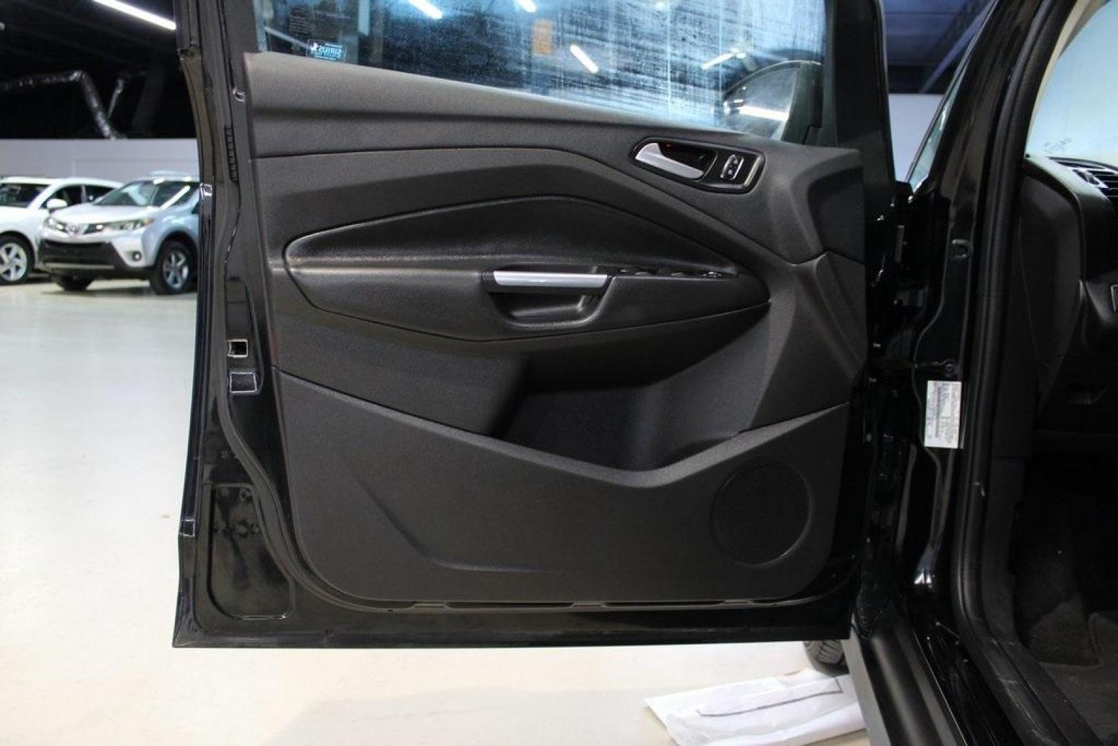 2015 Tuxedo Black /Black Ford C-Max Energi SEL (1FADP5CU7FL) with an I4 Hybrid engine, CVT transmission, located at 15300 Midway Rd., Addison, TX, 75001, (972) 702-0011, 32.958321, -96.838074 - Photo#29