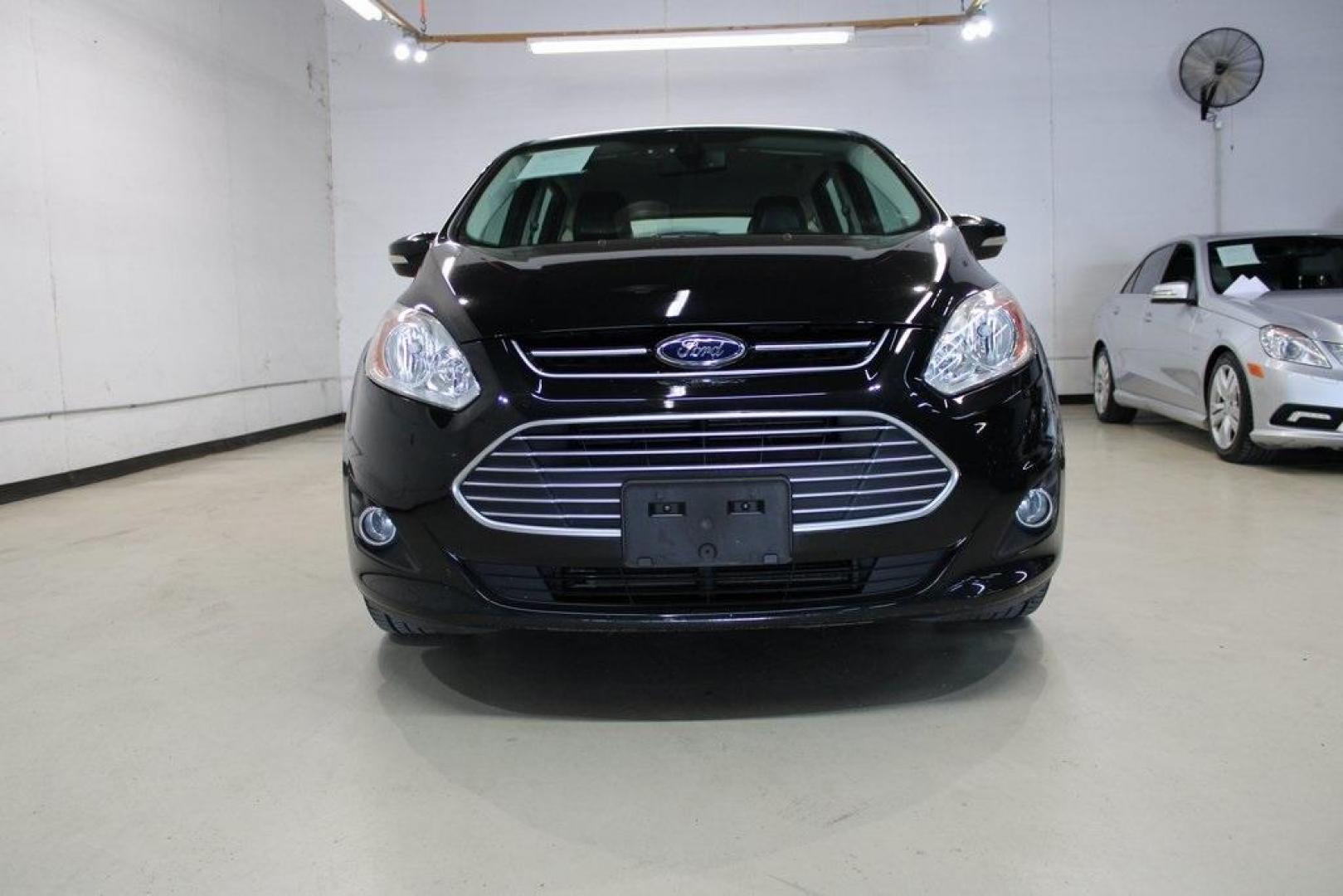 2015 Tuxedo Black /Black Ford C-Max Energi SEL (1FADP5CU7FL) with an I4 Hybrid engine, CVT transmission, located at 15300 Midway Rd., Addison, TX, 75001, (972) 702-0011, 32.958321, -96.838074 - Photo#5