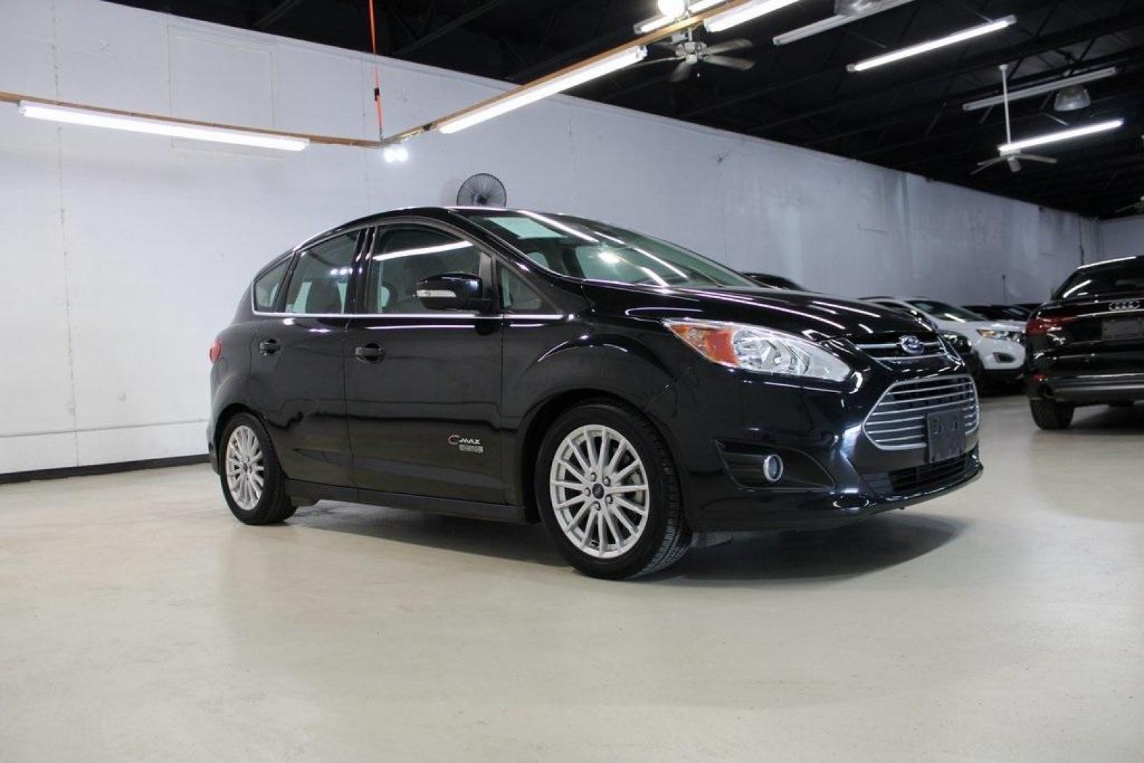 2015 Tuxedo Black /Black Ford C-Max Energi SEL (1FADP5CU7FL) with an I4 Hybrid engine, CVT transmission, located at 15300 Midway Rd., Addison, TX, 75001, (972) 702-0011, 32.958321, -96.838074 - Photo#6