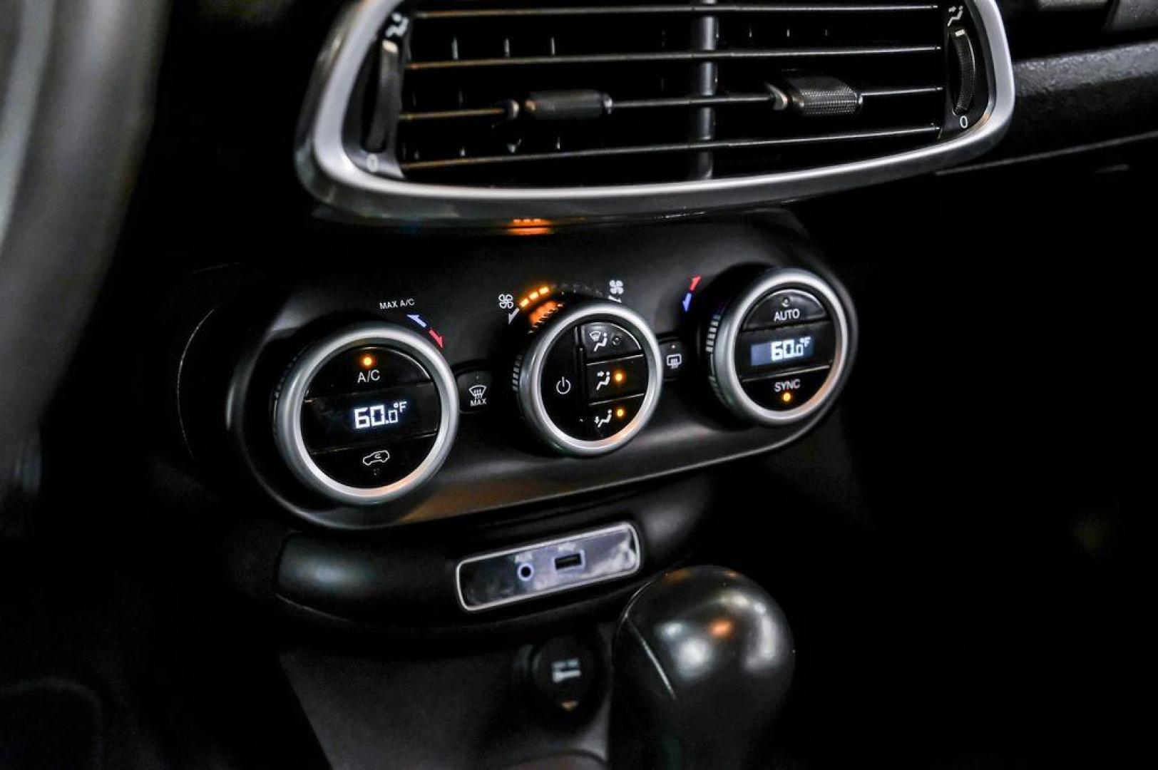 2017 Rosso Passione (Red Hypnotique Clear Coat) /Black Fiat 500X Trekking (ZFBCFXCB2HP) with an 2.4L I4 MultiAir engine, Automatic transmission, located at 15300 Midway Rd., Addison, TX, 75001, (972) 702-0011, 32.958321, -96.838074 - Photo#24