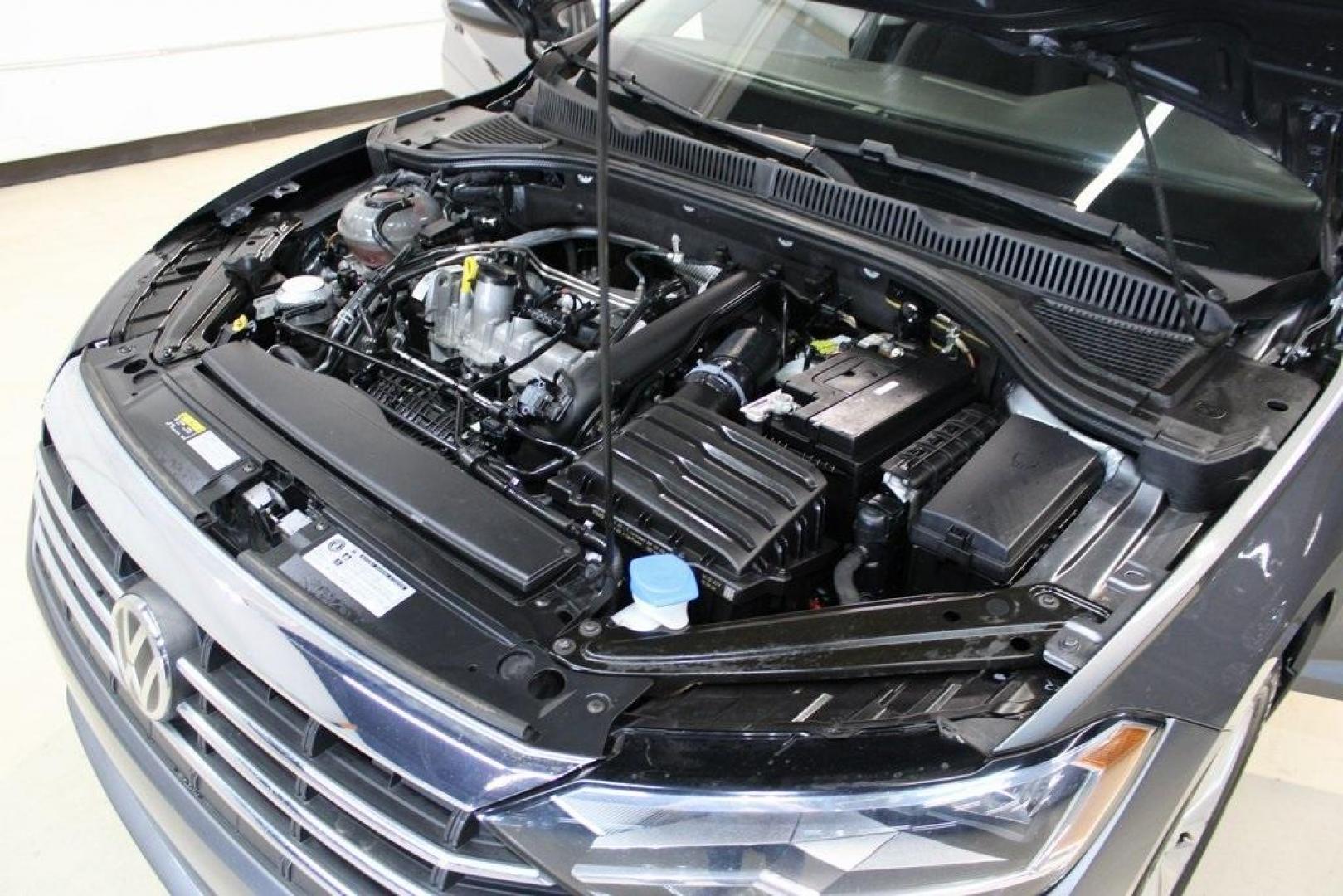 2019 Platinum Gray Metallic /Storm Gray Volkswagen Jetta 1.4T S (3VWC57BU4KM) with an 1.4L TSI engine, Automatic transmission, located at 15300 Midway Rd., Addison, TX, 75001, (972) 702-0011, 32.958321, -96.838074 - HOME OF THE NO HAGGLE PRICE - WHOLESALE PRICES TO THE PUBLIC!! non smoker, Jetta 1.4T S, 4D Sedan, 1.4L TSI, 8-Speed Automatic with Tiptronic, FWD, Gray.<br><br>Gray 2019 Volkswagen Jetta 1.4T S<br><br>Recent Arrival! 30/40 City/Highway MPG<br><br>Awards:<br> * 2019 KBB.com 10 Best Sedans Under $30 - Photo#21
