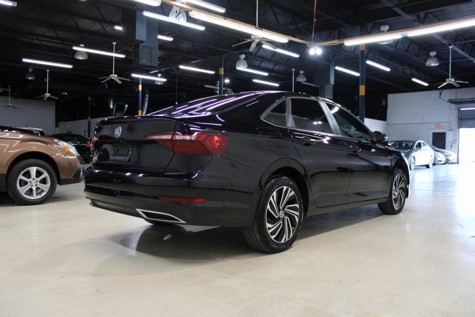2020 Deep Black Pearl Metallic /Dark Beige/Black Volkswagen Jetta SEL Premium (3VWG57BU8LM) with an 1.4L TSI engine, Automatic transmission, located at 15300 Midway Rd., Addison, TX, 75001, (972) 702-0011, 32.958321, -96.838074 - HOME OF THE NO HAGGLE PRICE - WHOLESALE PRICES TO THE PUBLIC!! Navigation, Backup Camera, Leather Seats, Sunroof / Moonroof, non smoker, Jetta SEL, 4D Sedan, 1.4L TSI, 8-Speed Automatic, FWD, Black, Dark Beige/Black Leather.<br><br>Black 2020 Volkswagen Jetta SEL Premium<br><br>Recent Arrival! 30/40 - Photo#3