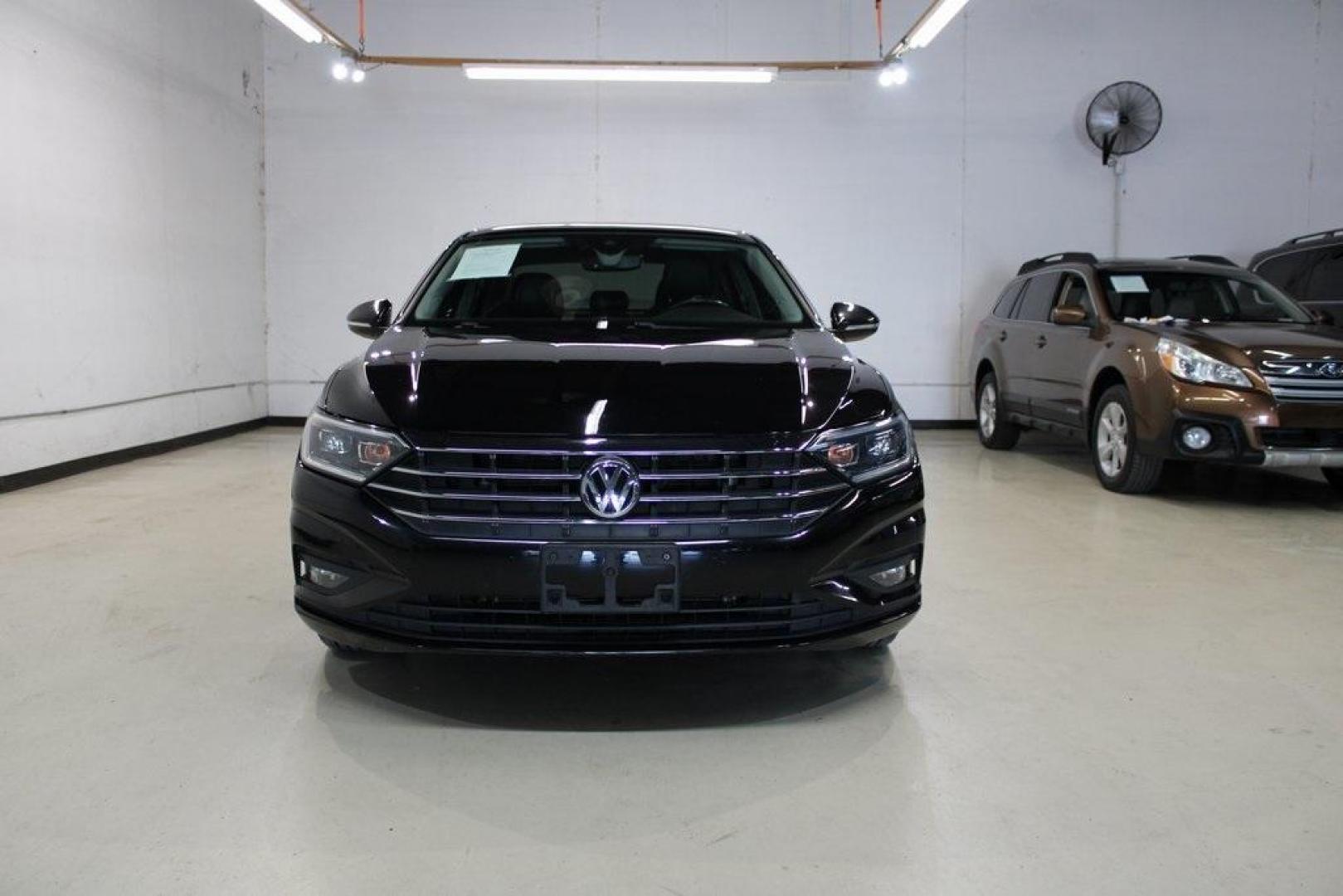 2020 Deep Black Pearl Metallic /Dark Beige/Black Volkswagen Jetta SEL Premium (3VWG57BU8LM) with an 1.4L TSI engine, Automatic transmission, located at 15300 Midway Rd., Addison, TX, 75001, (972) 702-0011, 32.958321, -96.838074 - HOME OF THE NO HAGGLE PRICE - WHOLESALE PRICES TO THE PUBLIC!! Navigation, Backup Camera, Leather Seats, Sunroof / Moonroof, non smoker, Jetta SEL, 4D Sedan, 1.4L TSI, 8-Speed Automatic, FWD, Black, Dark Beige/Black Leather.<br><br>Black 2020 Volkswagen Jetta SEL Premium<br><br>Recent Arrival! 30/40 - Photo#6