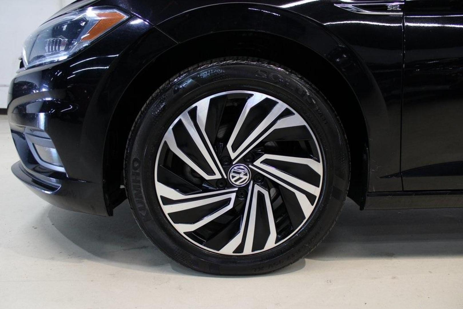 2020 Deep Black Pearl Metallic /Dark Beige/Black Volkswagen Jetta SEL Premium (3VWG57BU8LM) with an 1.4L TSI engine, Automatic transmission, located at 15300 Midway Rd., Addison, TX, 75001, (972) 702-0011, 32.958321, -96.838074 - HOME OF THE NO HAGGLE PRICE - WHOLESALE PRICES TO THE PUBLIC!! Navigation, Backup Camera, Leather Seats, Sunroof / Moonroof, non smoker, Jetta SEL, 4D Sedan, 1.4L TSI, 8-Speed Automatic, FWD, Black, Dark Beige/Black Leather.<br><br>Black 2020 Volkswagen Jetta SEL Premium<br><br>Recent Arrival! 30/40 - Photo#8