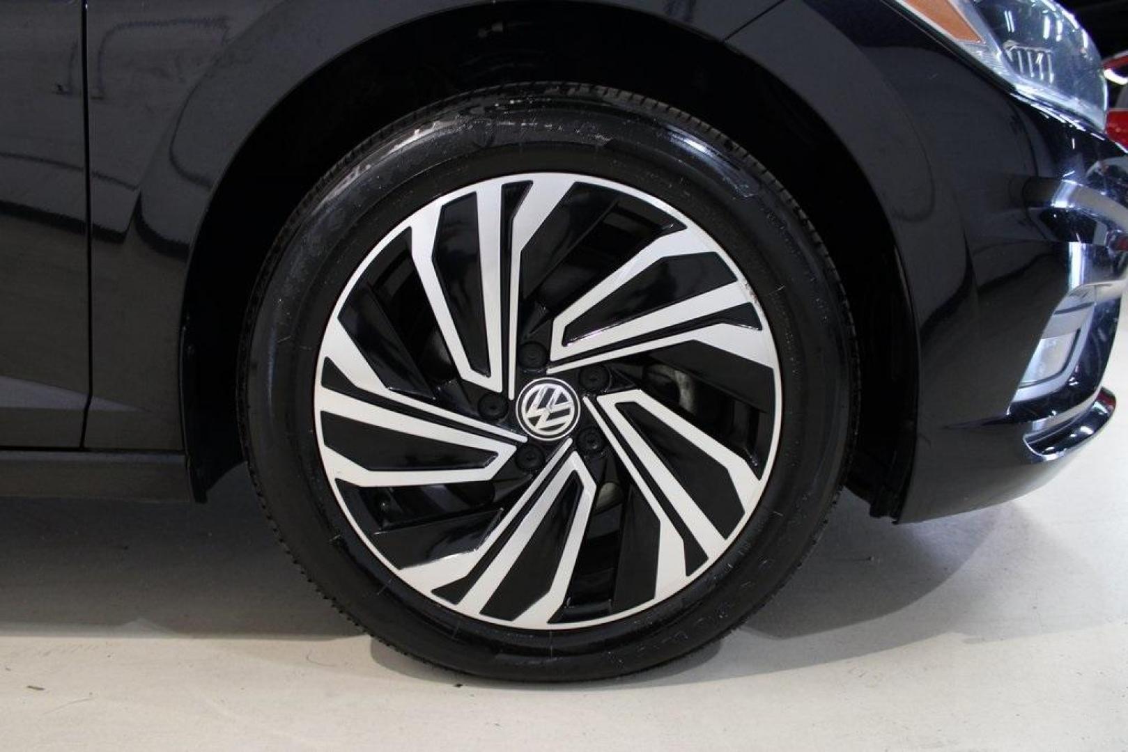 2020 Deep Black Pearl Metallic /Dark Beige/Black Volkswagen Jetta SEL Premium (3VWG57BU8LM) with an 1.4L TSI engine, Automatic transmission, located at 15300 Midway Rd., Addison, TX, 75001, (972) 702-0011, 32.958321, -96.838074 - HOME OF THE NO HAGGLE PRICE - WHOLESALE PRICES TO THE PUBLIC!! Navigation, Backup Camera, Leather Seats, Sunroof / Moonroof, non smoker, Jetta SEL, 4D Sedan, 1.4L TSI, 8-Speed Automatic, FWD, Black, Dark Beige/Black Leather.<br><br>Black 2020 Volkswagen Jetta SEL Premium<br><br>Recent Arrival! 30/40 - Photo#11