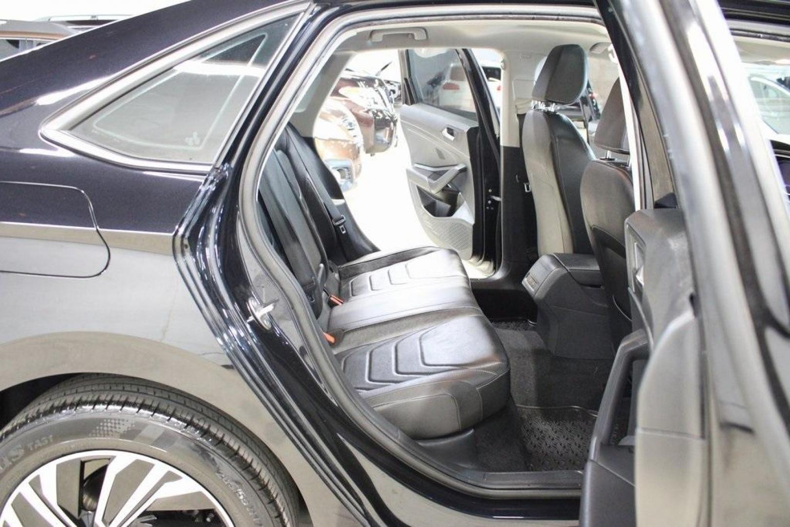 2020 Deep Black Pearl Metallic /Dark Beige/Black Volkswagen Jetta SEL Premium (3VWG57BU8LM) with an 1.4L TSI engine, Automatic transmission, located at 15300 Midway Rd., Addison, TX, 75001, (972) 702-0011, 32.958321, -96.838074 - HOME OF THE NO HAGGLE PRICE - WHOLESALE PRICES TO THE PUBLIC!! Navigation, Backup Camera, Leather Seats, Sunroof / Moonroof, non smoker, Jetta SEL, 4D Sedan, 1.4L TSI, 8-Speed Automatic, FWD, Black, Dark Beige/Black Leather.<br><br>Black 2020 Volkswagen Jetta SEL Premium<br><br>Recent Arrival! 30/40 - Photo#16