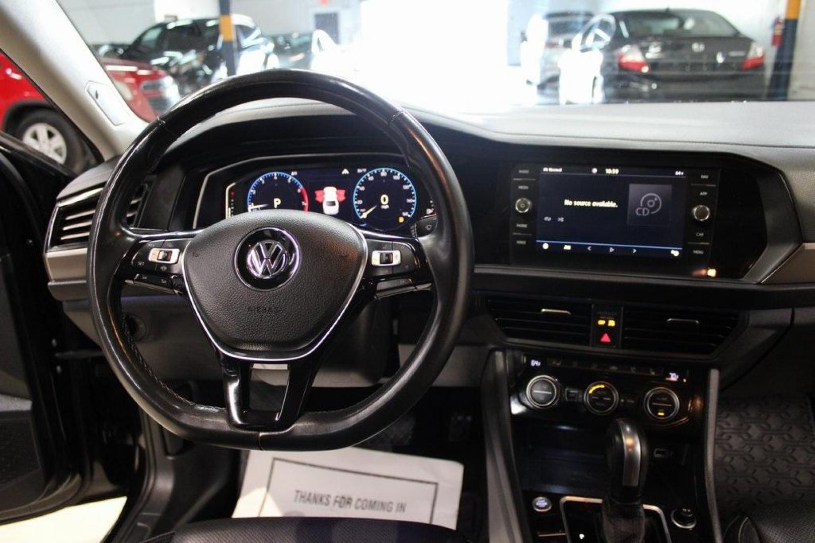 2020 Deep Black Pearl Metallic /Dark Beige/Black Volkswagen Jetta SEL Premium (3VWG57BU8LM) with an 1.4L TSI engine, Automatic transmission, located at 15300 Midway Rd., Addison, TX, 75001, (972) 702-0011, 32.958321, -96.838074 - HOME OF THE NO HAGGLE PRICE - WHOLESALE PRICES TO THE PUBLIC!! Navigation, Backup Camera, Leather Seats, Sunroof / Moonroof, non smoker, Jetta SEL, 4D Sedan, 1.4L TSI, 8-Speed Automatic, FWD, Black, Dark Beige/Black Leather.<br><br>Black 2020 Volkswagen Jetta SEL Premium<br><br>Recent Arrival! 30/40 - Photo#17