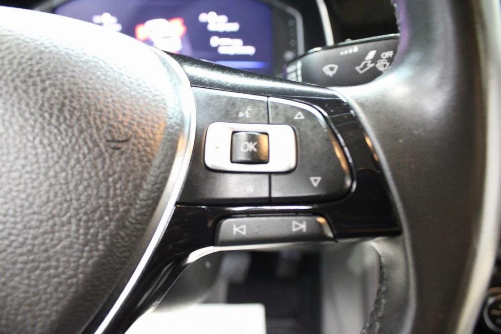 2020 Deep Black Pearl Metallic /Dark Beige/Black Volkswagen Jetta SEL Premium (3VWG57BU8LM) with an 1.4L TSI engine, Automatic transmission, located at 15300 Midway Rd., Addison, TX, 75001, (972) 702-0011, 32.958321, -96.838074 - HOME OF THE NO HAGGLE PRICE - WHOLESALE PRICES TO THE PUBLIC!! Navigation, Backup Camera, Leather Seats, Sunroof / Moonroof, non smoker, Jetta SEL, 4D Sedan, 1.4L TSI, 8-Speed Automatic, FWD, Black, Dark Beige/Black Leather.<br><br>Black 2020 Volkswagen Jetta SEL Premium<br><br>Recent Arrival! 30/40 - Photo#25