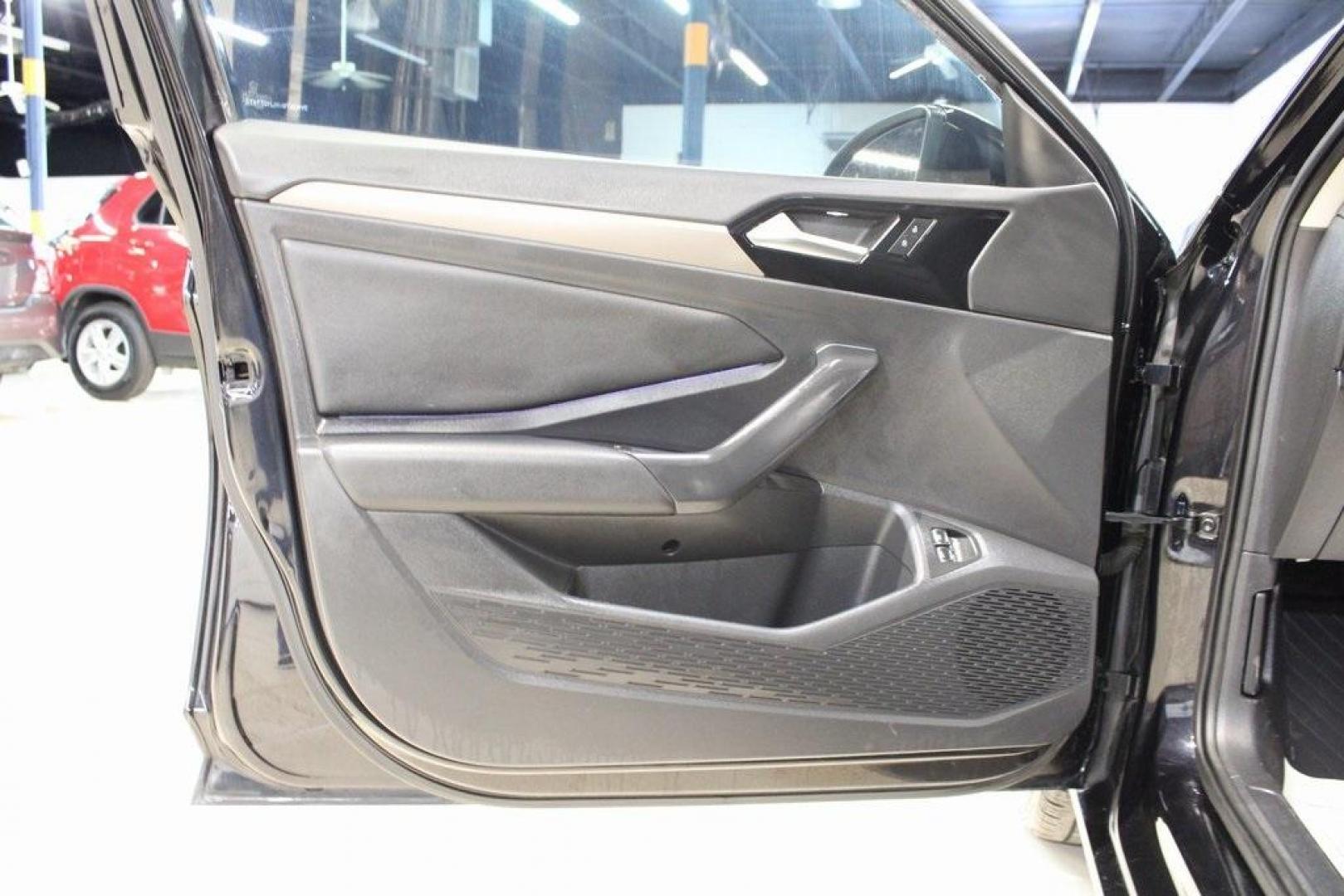 2020 Deep Black Pearl Metallic /Dark Beige/Black Volkswagen Jetta SEL Premium (3VWG57BU8LM) with an 1.4L TSI engine, Automatic transmission, located at 15300 Midway Rd., Addison, TX, 75001, (972) 702-0011, 32.958321, -96.838074 - HOME OF THE NO HAGGLE PRICE - WHOLESALE PRICES TO THE PUBLIC!! Navigation, Backup Camera, Leather Seats, Sunroof / Moonroof, non smoker, Jetta SEL, 4D Sedan, 1.4L TSI, 8-Speed Automatic, FWD, Black, Dark Beige/Black Leather.<br><br>Black 2020 Volkswagen Jetta SEL Premium<br><br>Recent Arrival! 30/40 - Photo#27
