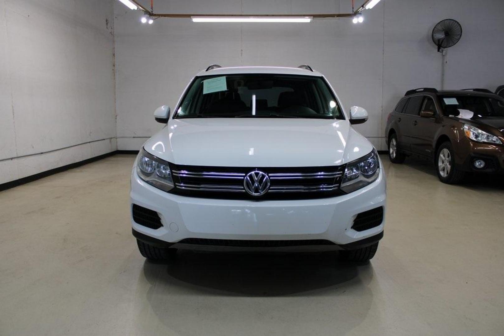 2017 Pure White Volkswagen Tiguan 2.0T S (WVGAV7AX1HK) with an 2.0L TSI DOHC engine, Automatic transmission, located at 15300 Midway Rd., Addison, TX, 75001, (972) 702-0011, 32.958321, -96.838074 - Photo#9