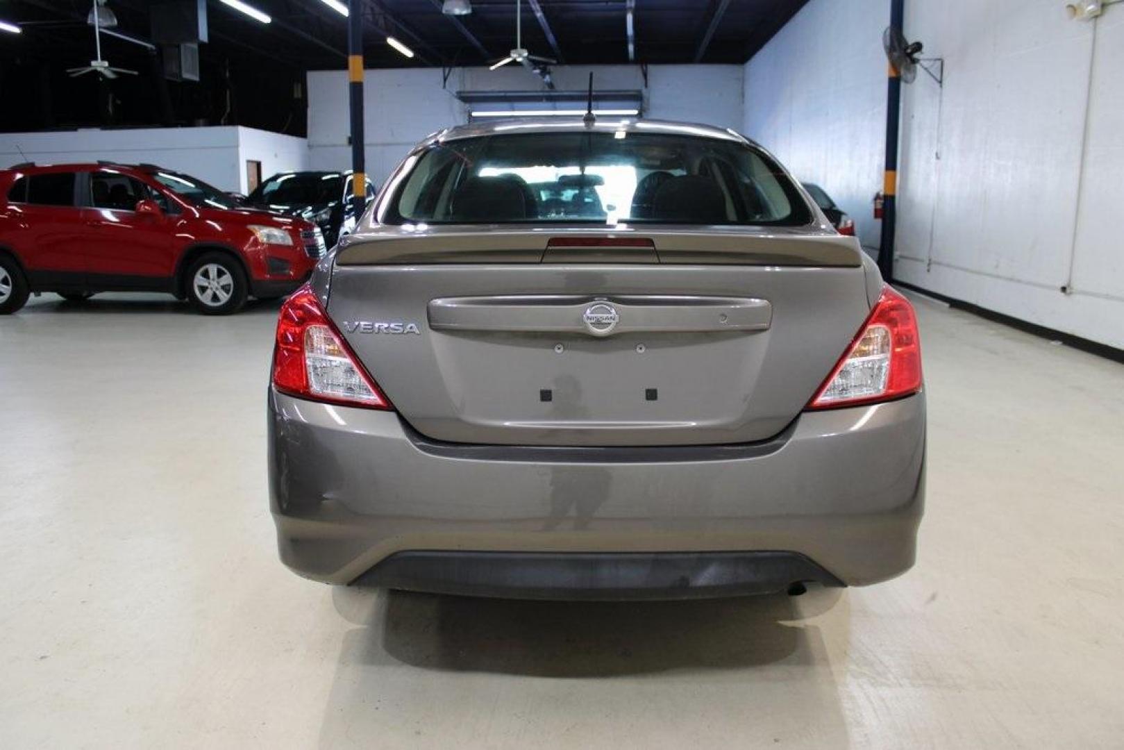 2017 Titanium /Charcoal Nissan Versa 1.6 S Plus (3N1CN7AP9HL) with an 1.6L I4 DOHC 16V engine, CVT transmission, located at 15300 Midway Rd., Addison, TX, 75001, (972) 702-0011, 32.958321, -96.838074 - Introducing the 2017 Nissan Versa 1.6 SV, now available at Midway Auto Group in Addison, Texas. This compact sedan offers a blend of efficiency, comfort, and modern features, making it an excellent choice for daily commutes and city driving.<br>BidFax<br><br>Key Features:<br><br>Engine: 1.6L I4 DOHC - Photo#9