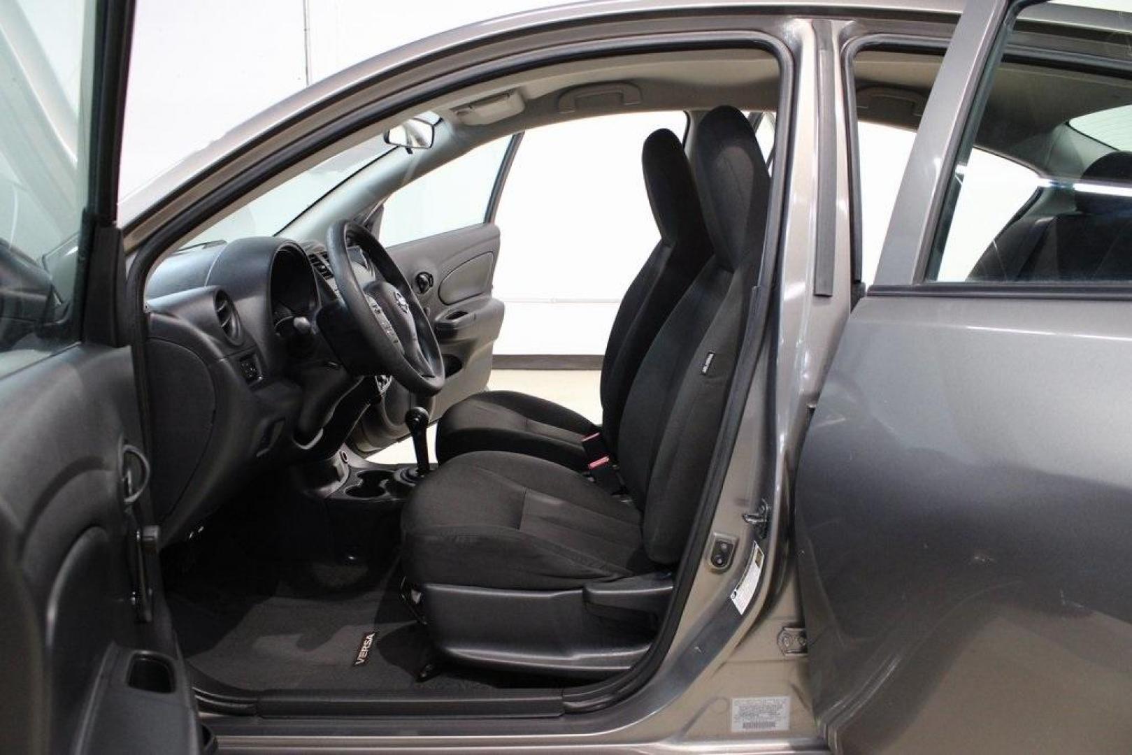 2017 Titanium /Charcoal Nissan Versa 1.6 S Plus (3N1CN7AP9HL) with an 1.6L I4 DOHC 16V engine, CVT transmission, located at 15300 Midway Rd., Addison, TX, 75001, (972) 702-0011, 32.958321, -96.838074 - Introducing the 2017 Nissan Versa 1.6 SV, now available at Midway Auto Group in Addison, Texas. This compact sedan offers a blend of efficiency, comfort, and modern features, making it an excellent choice for daily commutes and city driving.<br>BidFax<br><br>Key Features:<br><br>Engine: 1.6L I4 DOHC - Photo#15
