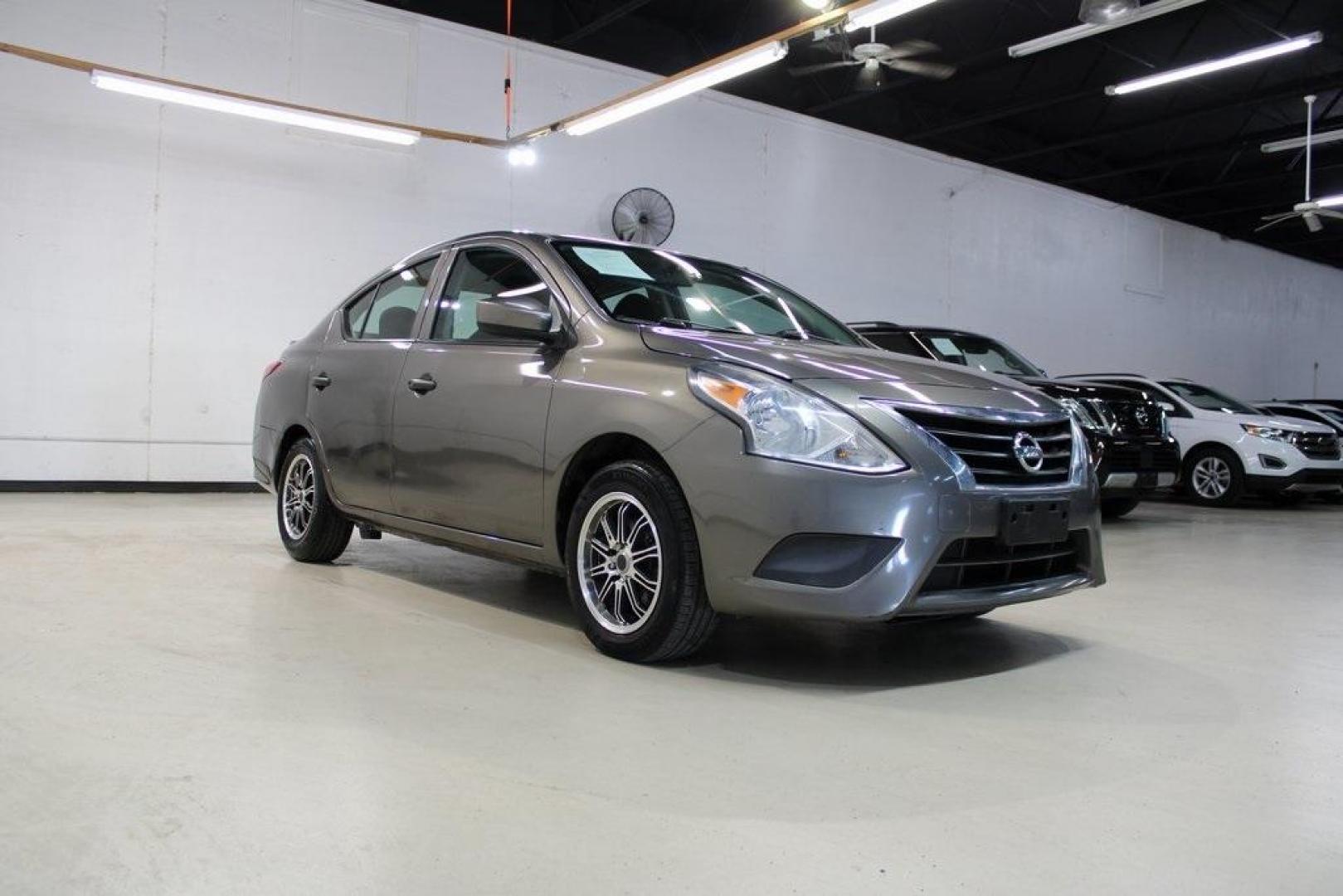 2017 Titanium /Charcoal Nissan Versa 1.6 S Plus (3N1CN7AP9HL) with an 1.6L I4 DOHC 16V engine, CVT transmission, located at 15300 Midway Rd., Addison, TX, 75001, (972) 702-0011, 32.958321, -96.838074 - Introducing the 2017 Nissan Versa 1.6 SV, now available at Midway Auto Group in Addison, Texas. This compact sedan offers a blend of efficiency, comfort, and modern features, making it an excellent choice for daily commutes and city driving.<br>BidFax<br><br>Key Features:<br><br>Engine: 1.6L I4 DOHC - Photo#1