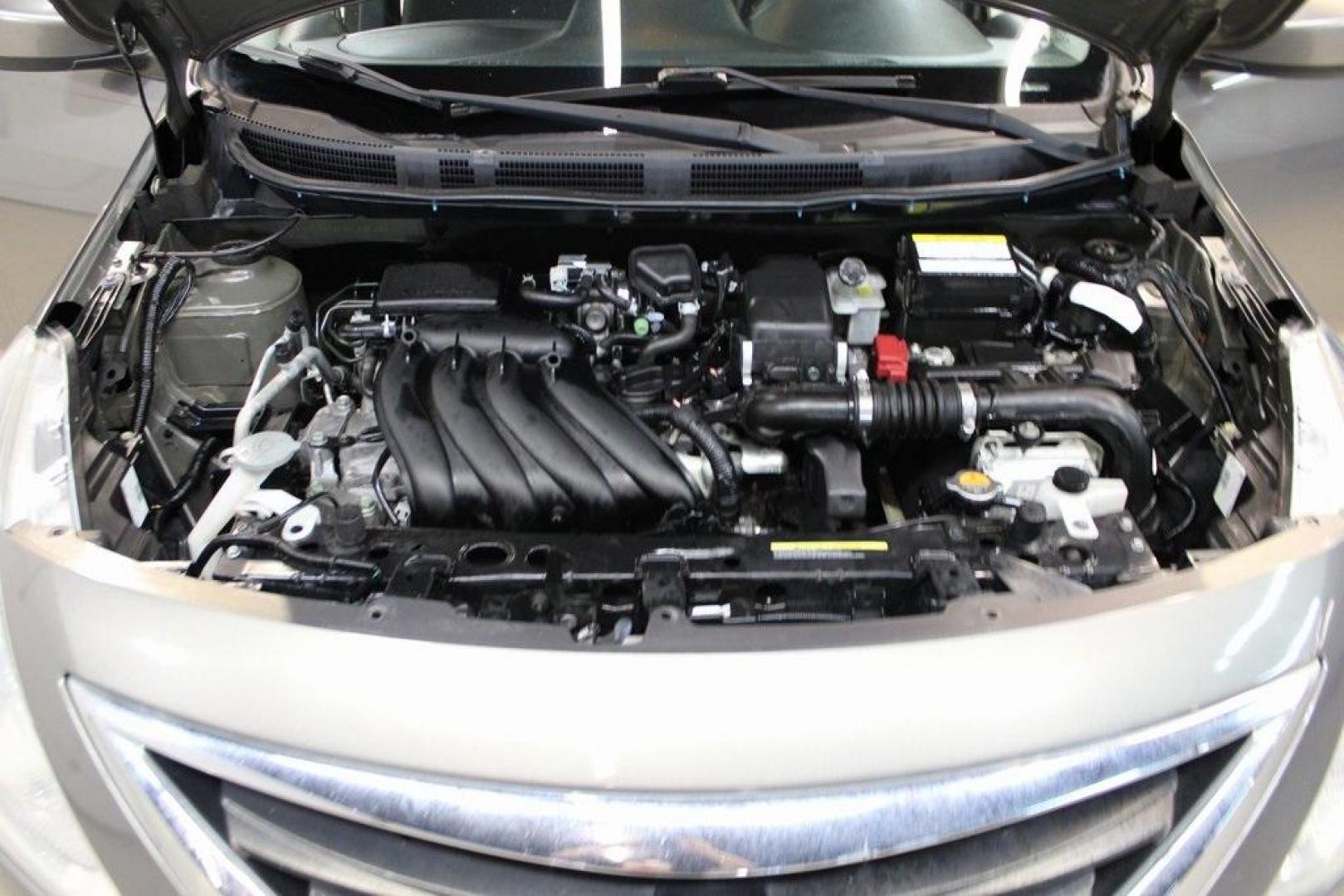 2017 Titanium /Charcoal Nissan Versa 1.6 S Plus (3N1CN7AP9HL) with an 1.6L I4 DOHC 16V engine, CVT transmission, located at 15300 Midway Rd., Addison, TX, 75001, (972) 702-0011, 32.958321, -96.838074 - Introducing the 2017 Nissan Versa 1.6 SV, now available at Midway Auto Group in Addison, Texas. This compact sedan offers a blend of efficiency, comfort, and modern features, making it an excellent choice for daily commutes and city driving.<br>BidFax<br><br>Key Features:<br><br>Engine: 1.6L I4 DOHC - Photo#27