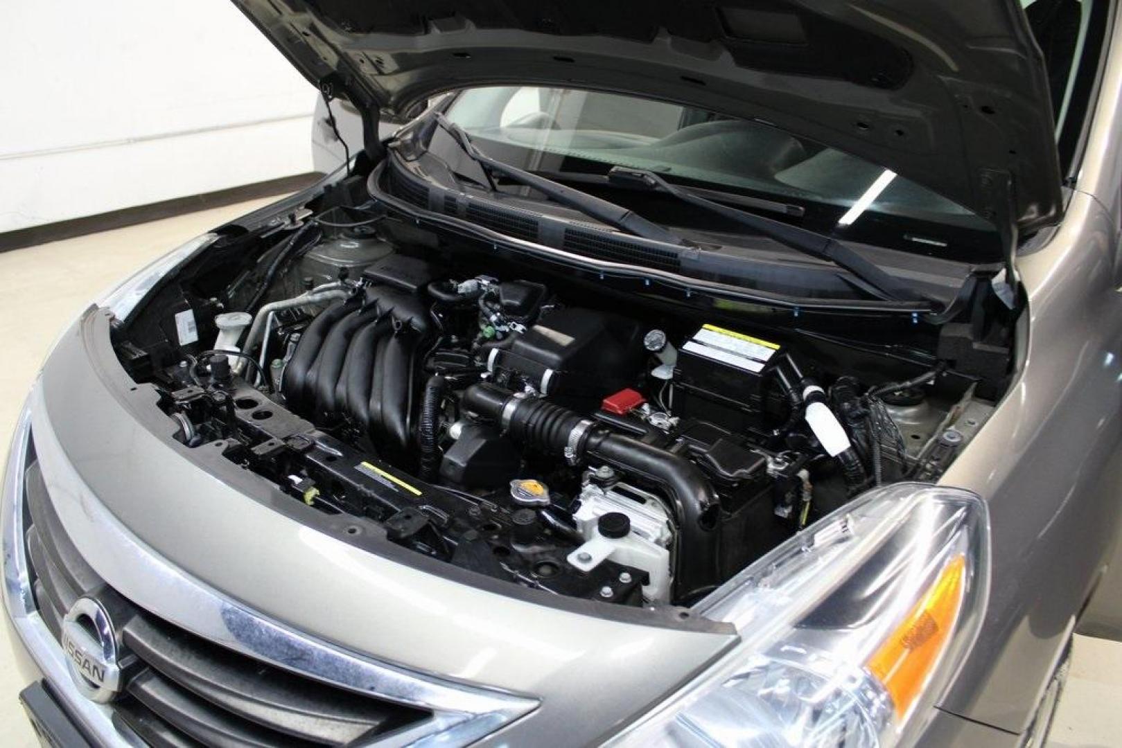 2017 Titanium /Charcoal Nissan Versa 1.6 S Plus (3N1CN7AP9HL) with an 1.6L I4 DOHC 16V engine, CVT transmission, located at 15300 Midway Rd., Addison, TX, 75001, (972) 702-0011, 32.958321, -96.838074 - Introducing the 2017 Nissan Versa 1.6 SV, now available at Midway Auto Group in Addison, Texas. This compact sedan offers a blend of efficiency, comfort, and modern features, making it an excellent choice for daily commutes and city driving.<br>BidFax<br><br>Key Features:<br><br>Engine: 1.6L I4 DOHC - Photo#28