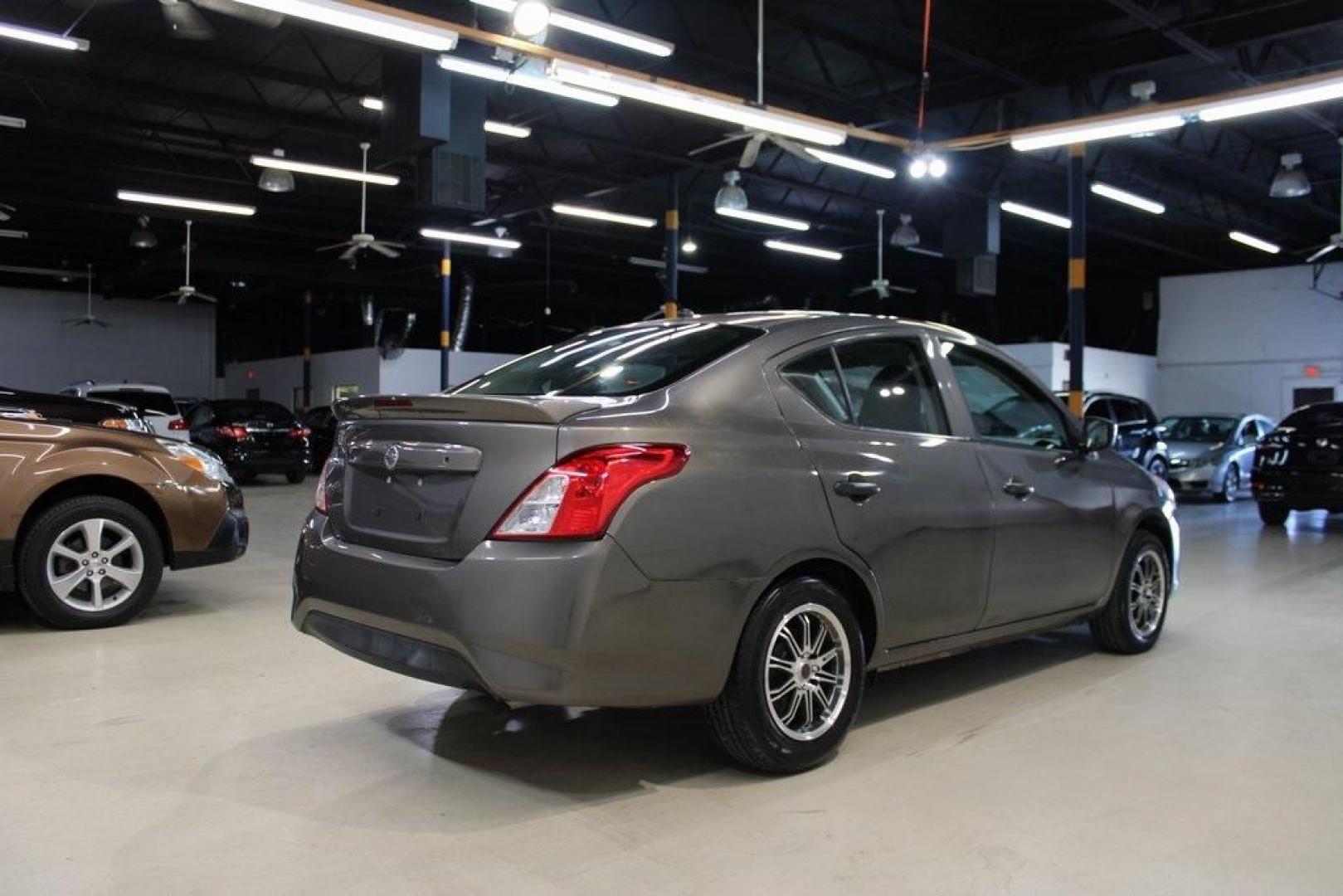 2017 Titanium /Charcoal Nissan Versa 1.6 S Plus (3N1CN7AP9HL) with an 1.6L I4 DOHC 16V engine, CVT transmission, located at 15300 Midway Rd., Addison, TX, 75001, (972) 702-0011, 32.958321, -96.838074 - Introducing the 2017 Nissan Versa 1.6 SV, now available at Midway Auto Group in Addison, Texas. This compact sedan offers a blend of efficiency, comfort, and modern features, making it an excellent choice for daily commutes and city driving.<br>BidFax<br><br>Key Features:<br><br>Engine: 1.6L I4 DOHC - Photo#2