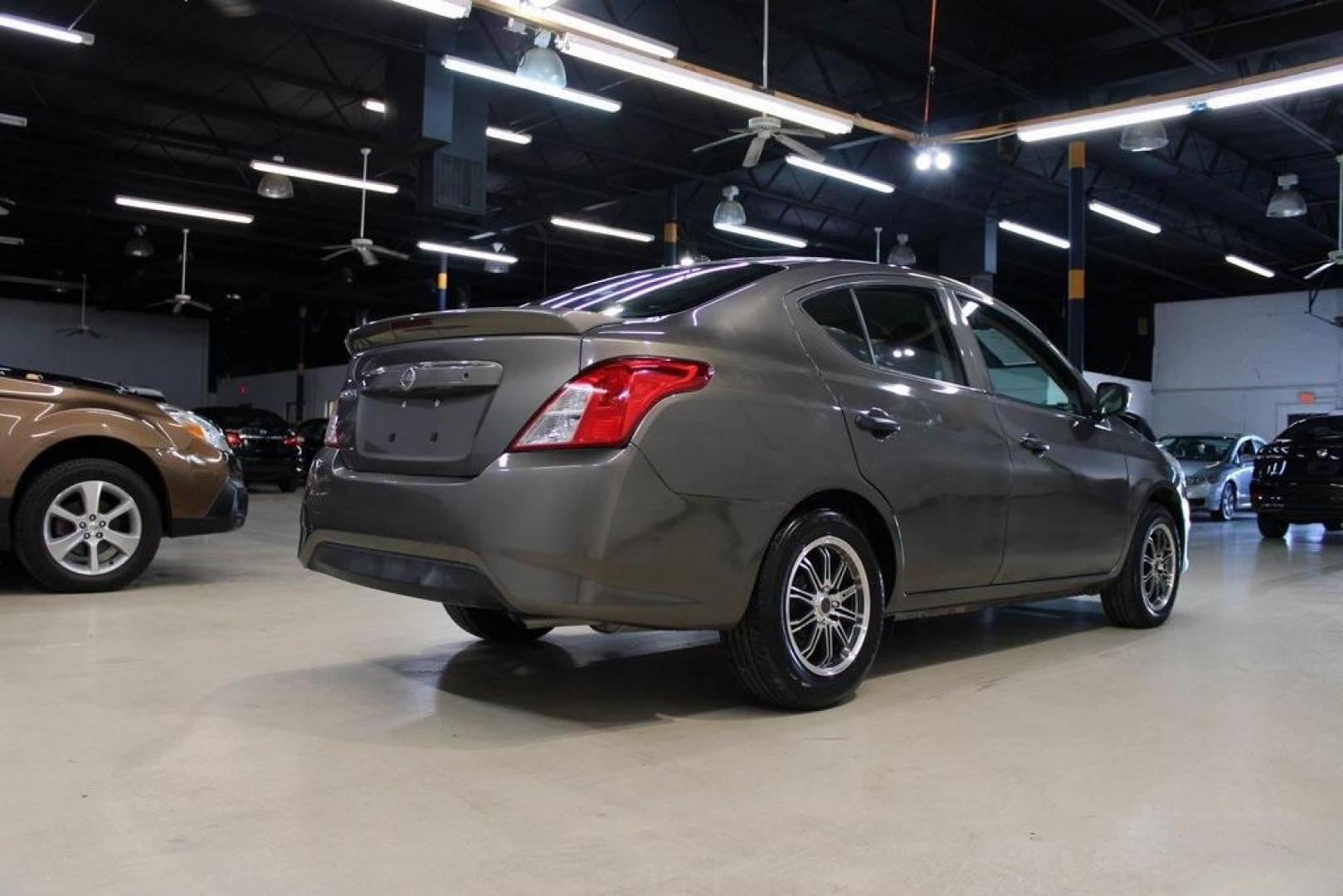 2017 Titanium /Charcoal Nissan Versa 1.6 S Plus (3N1CN7AP9HL) with an 1.6L I4 DOHC 16V engine, CVT transmission, located at 15300 Midway Rd., Addison, TX, 75001, (972) 702-0011, 32.958321, -96.838074 - Introducing the 2017 Nissan Versa 1.6 SV, now available at Midway Auto Group in Addison, Texas. This compact sedan offers a blend of efficiency, comfort, and modern features, making it an excellent choice for daily commutes and city driving.<br>BidFax<br><br>Key Features:<br><br>Engine: 1.6L I4 DOHC - Photo#3