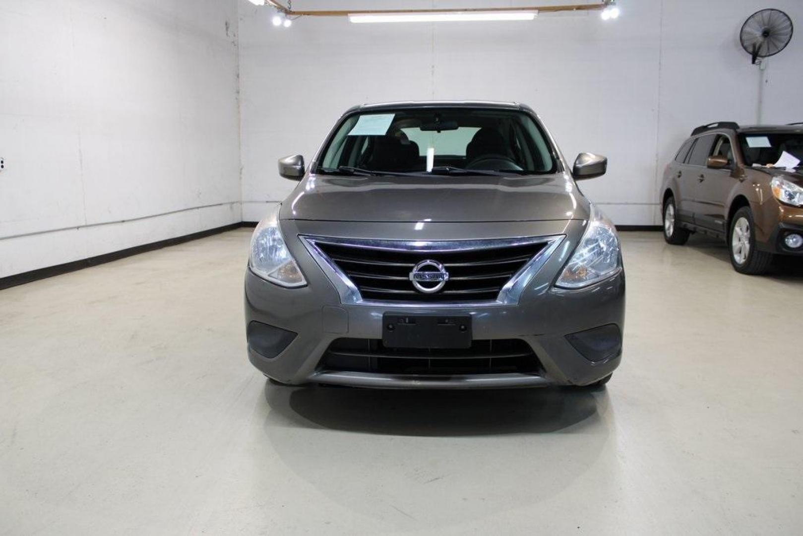 2017 Titanium /Charcoal Nissan Versa 1.6 S Plus (3N1CN7AP9HL) with an 1.6L I4 DOHC 16V engine, CVT transmission, located at 15300 Midway Rd., Addison, TX, 75001, (972) 702-0011, 32.958321, -96.838074 - Introducing the 2017 Nissan Versa 1.6 SV, now available at Midway Auto Group in Addison, Texas. This compact sedan offers a blend of efficiency, comfort, and modern features, making it an excellent choice for daily commutes and city driving.<br>BidFax<br><br>Key Features:<br><br>Engine: 1.6L I4 DOHC - Photo#7