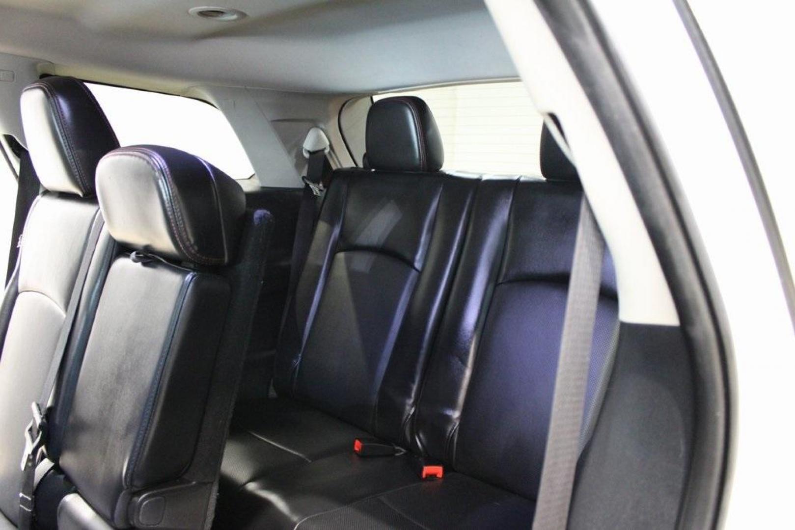2019 Vice White /Red Dodge Journey GT (3C4PDDEG8KT) with an 3.6L V6 24V VVT engine, Automatic transmission, located at 15300 Midway Rd., Addison, TX, 75001, (972) 702-0011, 32.958321, -96.838074 - Introducing the 2019 Dodge Journey GT AWD, now available at Midway Auto Group in Addison, Texas. This versatile SUV combines robust performance, ample space, and modern features, making it an excellent choice for families and adventurers alike.<br><br>Key Features:<br><br>Engine: 3.6L V6 producing 2 - Photo#16