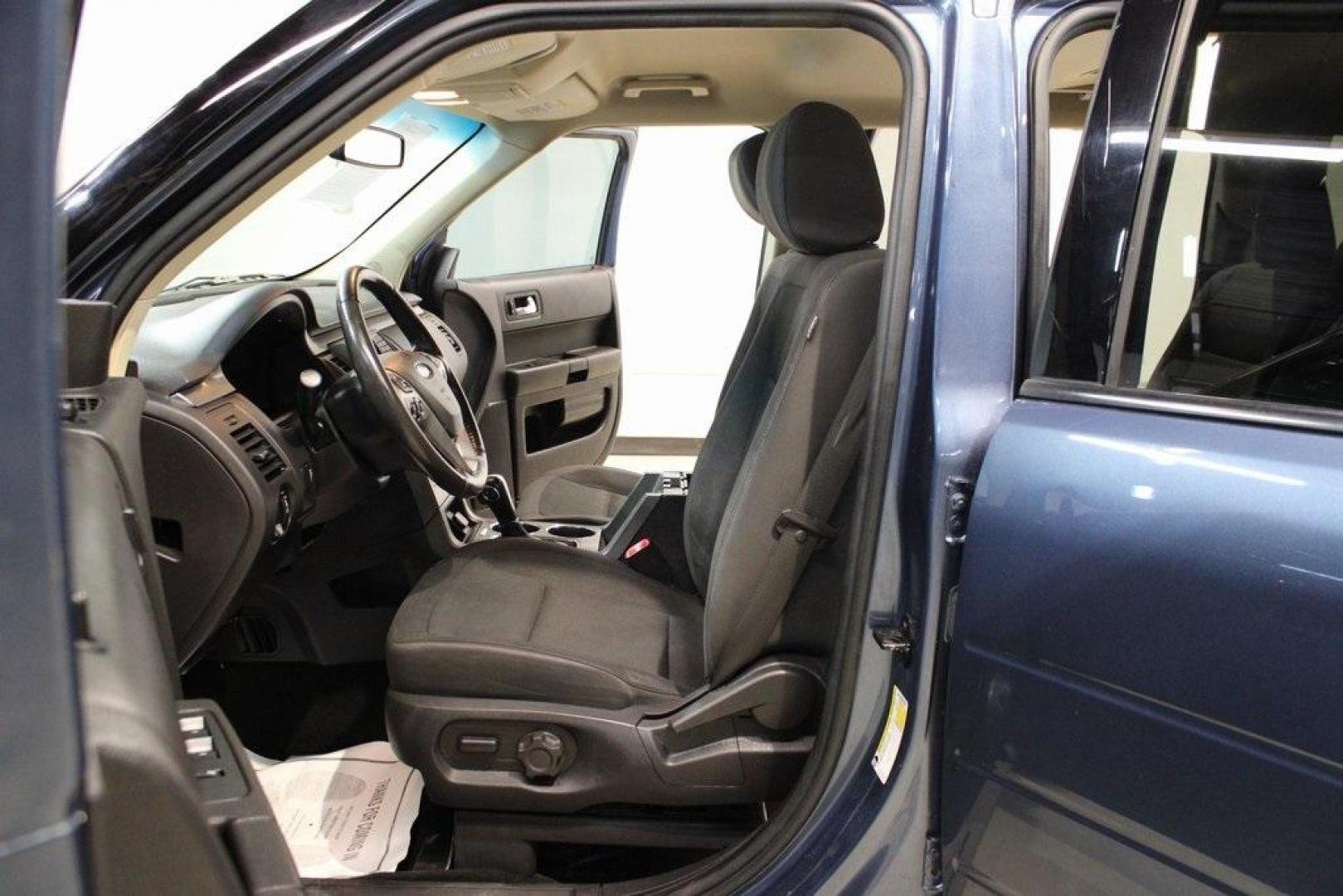2018 Blue /Charcoal Black Ford Flex SE (2FMGK5B87JB) with an 3.5L V6 Ti-VCT engine, Automatic transmission, located at 15300 Midway Rd., Addison, TX, 75001, (972) 702-0011, 32.958321, -96.838074 - Introducing the 2018 Ford Flex SE, now available at Midway Auto Group in Addison, Texas. This spacious and versatile SUV offers a comfortable ride with ample room for passengers and cargo, making it an excellent choice for families and travelers alike.<br><br>Key Features:<br><br>Engine: 3.5L V6 Ti- - Photo#14