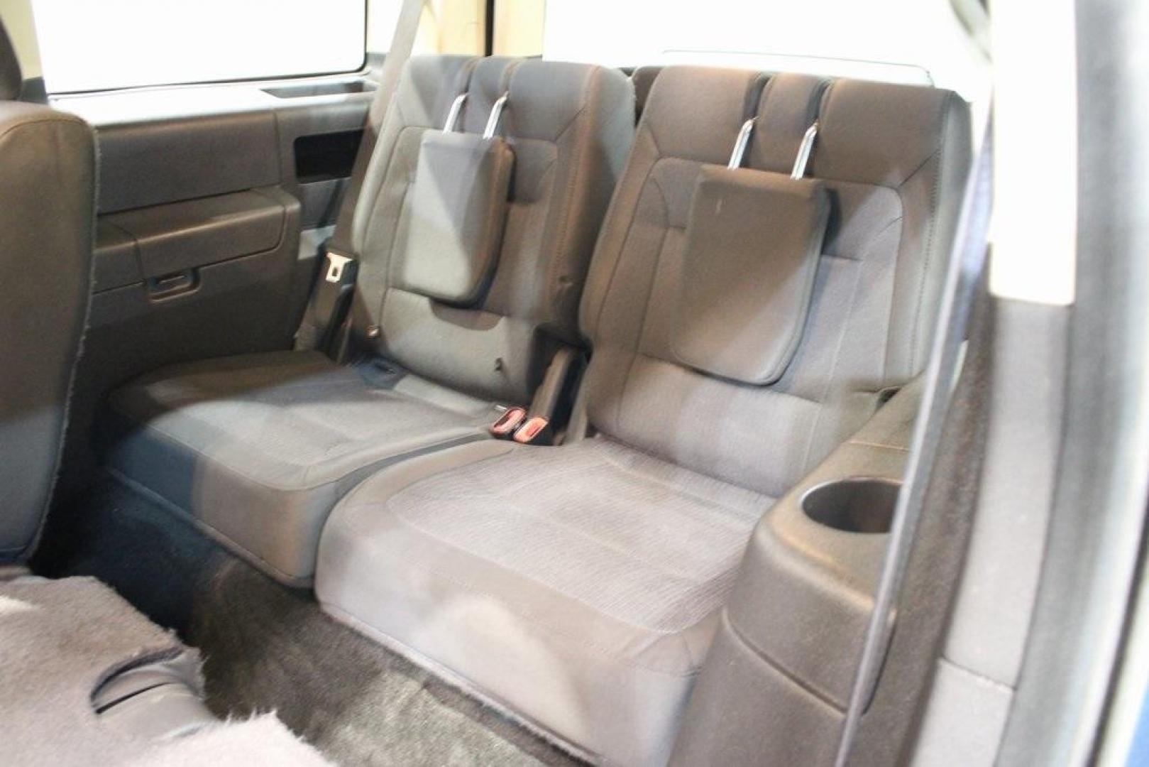 2018 Blue /Charcoal Black Ford Flex SE (2FMGK5B87JB) with an 3.5L V6 Ti-VCT engine, Automatic transmission, located at 15300 Midway Rd., Addison, TX, 75001, (972) 702-0011, 32.958321, -96.838074 - Introducing the 2018 Ford Flex SE, now available at Midway Auto Group in Addison, Texas. This spacious and versatile SUV offers a comfortable ride with ample room for passengers and cargo, making it an excellent choice for families and travelers alike.<br><br>Key Features:<br><br>Engine: 3.5L V6 Ti- - Photo#18