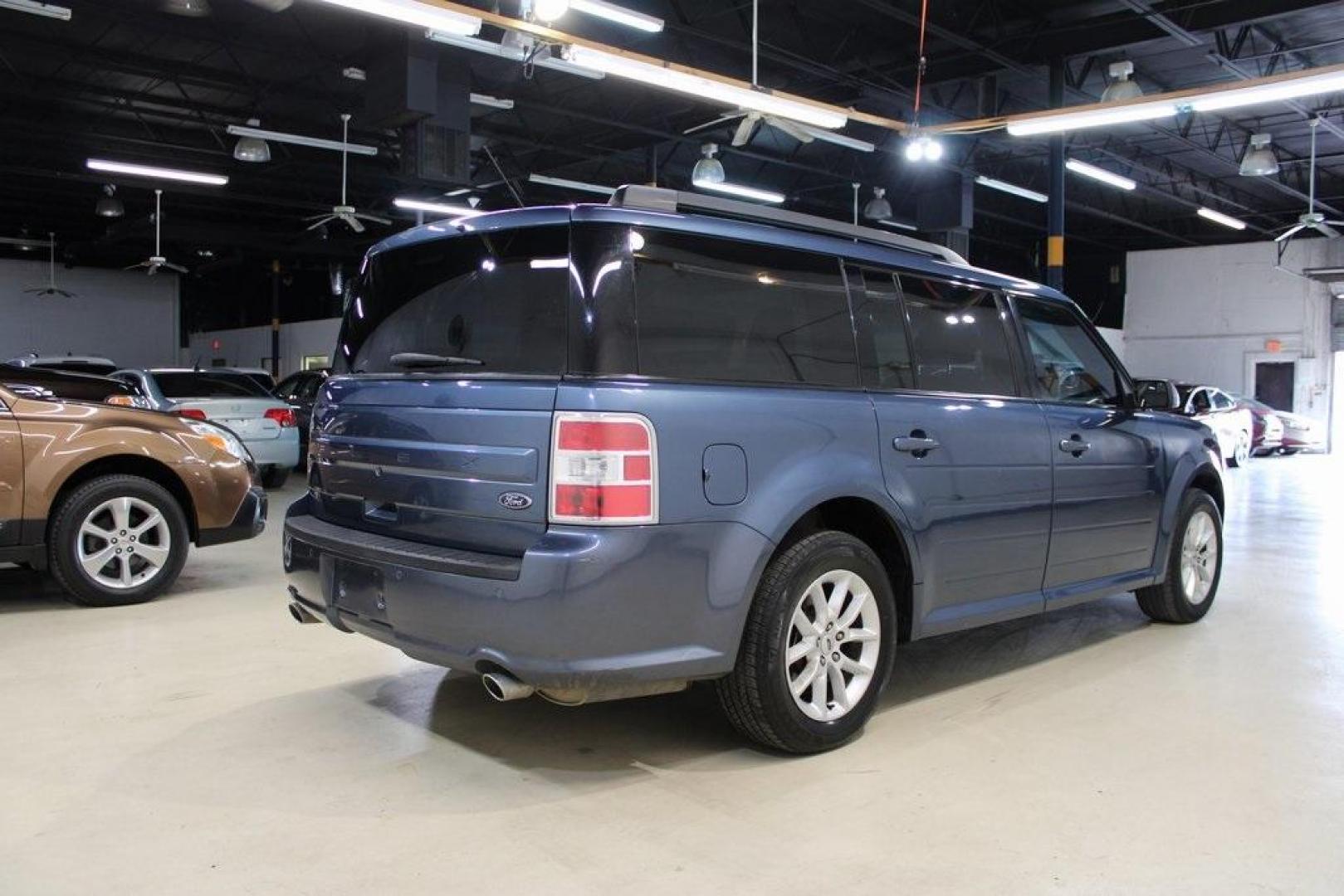 2018 Blue /Charcoal Black Ford Flex SE (2FMGK5B87JB) with an 3.5L V6 Ti-VCT engine, Automatic transmission, located at 15300 Midway Rd., Addison, TX, 75001, (972) 702-0011, 32.958321, -96.838074 - Introducing the 2018 Ford Flex SE, now available at Midway Auto Group in Addison, Texas. This spacious and versatile SUV offers a comfortable ride with ample room for passengers and cargo, making it an excellent choice for families and travelers alike.<br><br>Key Features:<br><br>Engine: 3.5L V6 Ti- - Photo#2