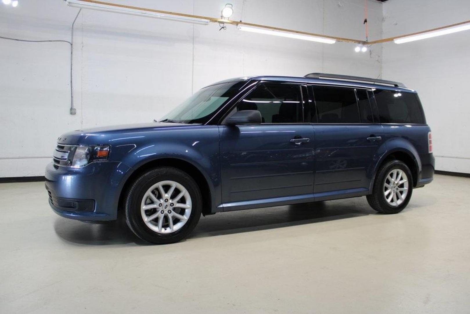 2018 Blue /Charcoal Black Ford Flex SE (2FMGK5B87JB) with an 3.5L V6 Ti-VCT engine, Automatic transmission, located at 15300 Midway Rd., Addison, TX, 75001, (972) 702-0011, 32.958321, -96.838074 - Introducing the 2018 Ford Flex SE, now available at Midway Auto Group in Addison, Texas. This spacious and versatile SUV offers a comfortable ride with ample room for passengers and cargo, making it an excellent choice for families and travelers alike.<br><br>Key Features:<br><br>Engine: 3.5L V6 Ti- - Photo#4