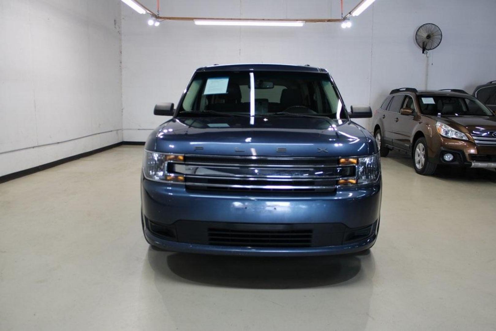2018 Blue /Charcoal Black Ford Flex SE (2FMGK5B87JB) with an 3.5L V6 Ti-VCT engine, Automatic transmission, located at 15300 Midway Rd., Addison, TX, 75001, (972) 702-0011, 32.958321, -96.838074 - Introducing the 2018 Ford Flex SE, now available at Midway Auto Group in Addison, Texas. This spacious and versatile SUV offers a comfortable ride with ample room for passengers and cargo, making it an excellent choice for families and travelers alike.<br><br>Key Features:<br><br>Engine: 3.5L V6 Ti- - Photo#6