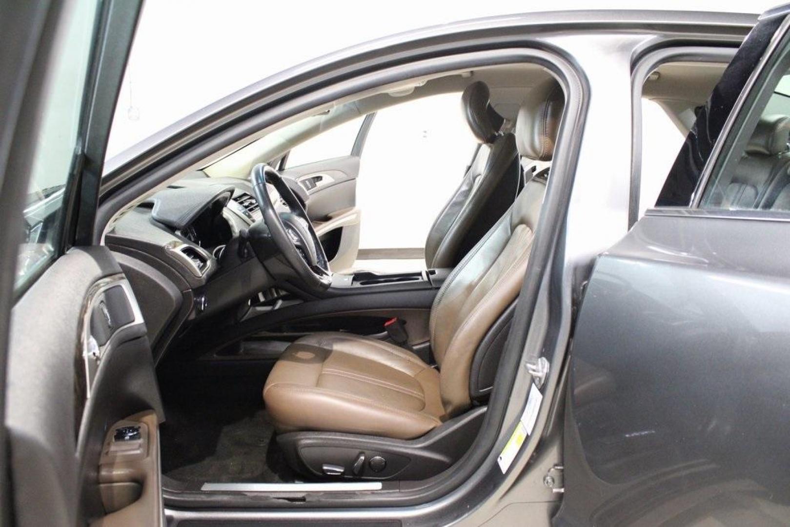 2014 Sterling Gray Metallic /Hazelnut Lincoln MKZ Hybrid (3LN6L2LUXER) with an 2.0L I4 Atkinson-Cycle iVCT engine, CVT transmission, located at 15300 Midway Rd., Addison, TX, 75001, (972) 702-0011, 32.958321, -96.838074 - Photo#9