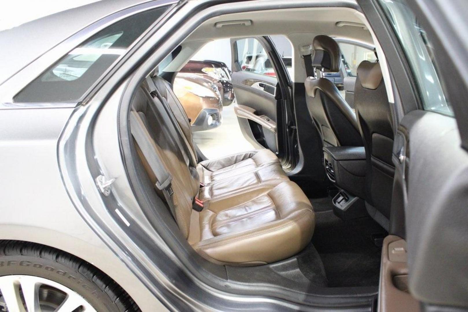 2014 Sterling Gray Metallic /Hazelnut Lincoln MKZ Hybrid (3LN6L2LUXER) with an 2.0L I4 Atkinson-Cycle iVCT engine, CVT transmission, located at 15300 Midway Rd., Addison, TX, 75001, (972) 702-0011, 32.958321, -96.838074 - Photo#11