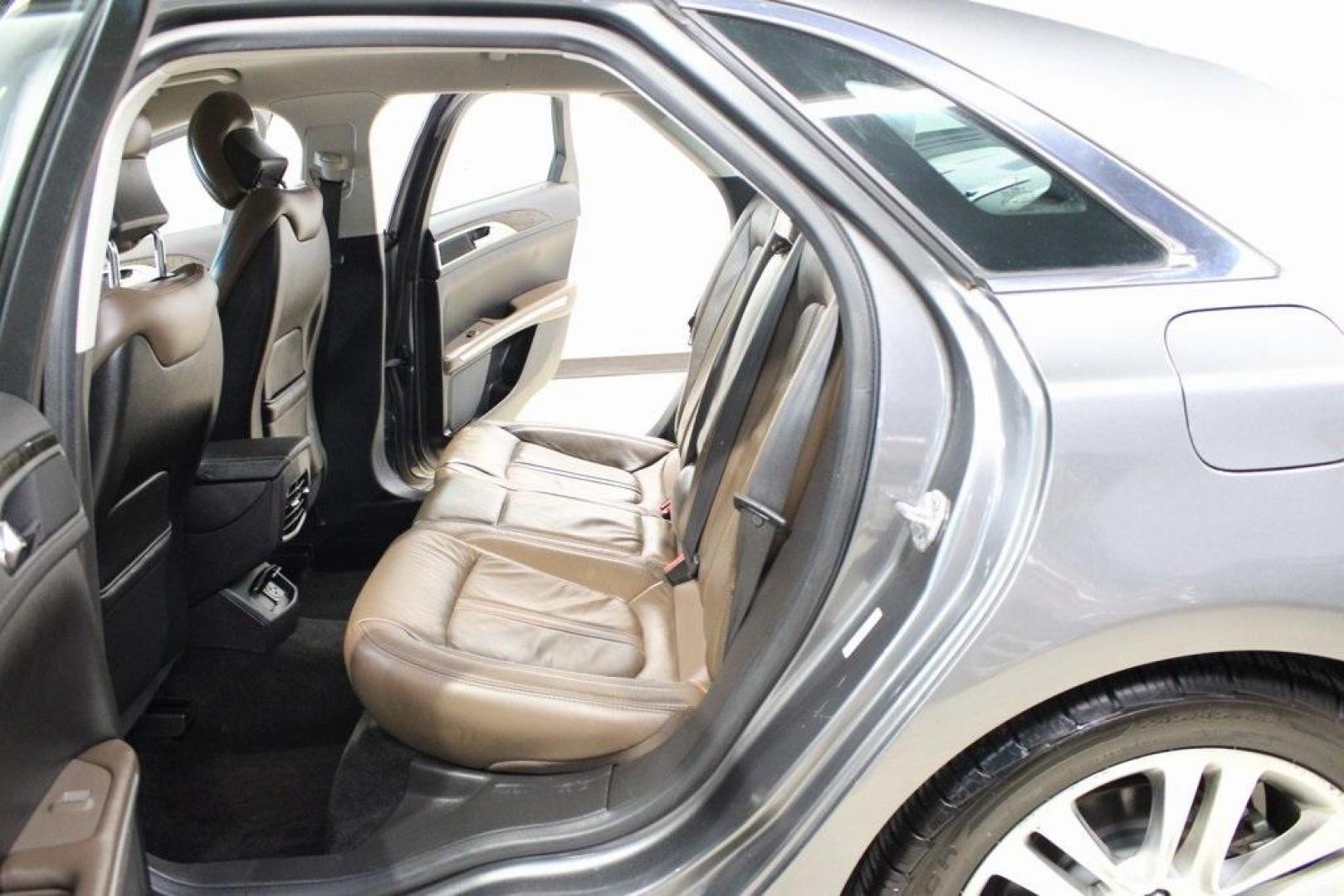 2014 Sterling Gray Metallic /Hazelnut Lincoln MKZ Hybrid (3LN6L2LUXER) with an 2.0L I4 Atkinson-Cycle iVCT engine, CVT transmission, located at 15300 Midway Rd., Addison, TX, 75001, (972) 702-0011, 32.958321, -96.838074 - Photo#12