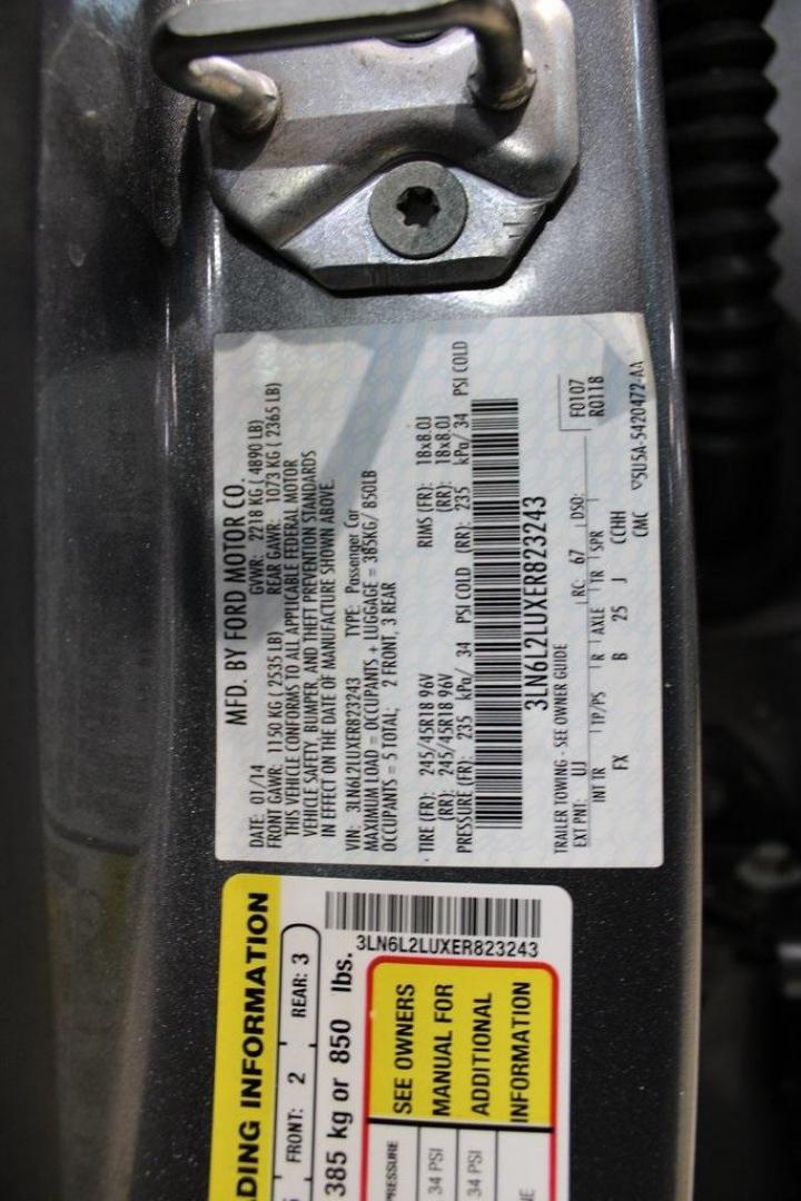 2014 Sterling Gray Metallic /Hazelnut Lincoln MKZ Hybrid (3LN6L2LUXER) with an 2.0L I4 Atkinson-Cycle iVCT engine, CVT transmission, located at 15300 Midway Rd., Addison, TX, 75001, (972) 702-0011, 32.958321, -96.838074 - Photo#26