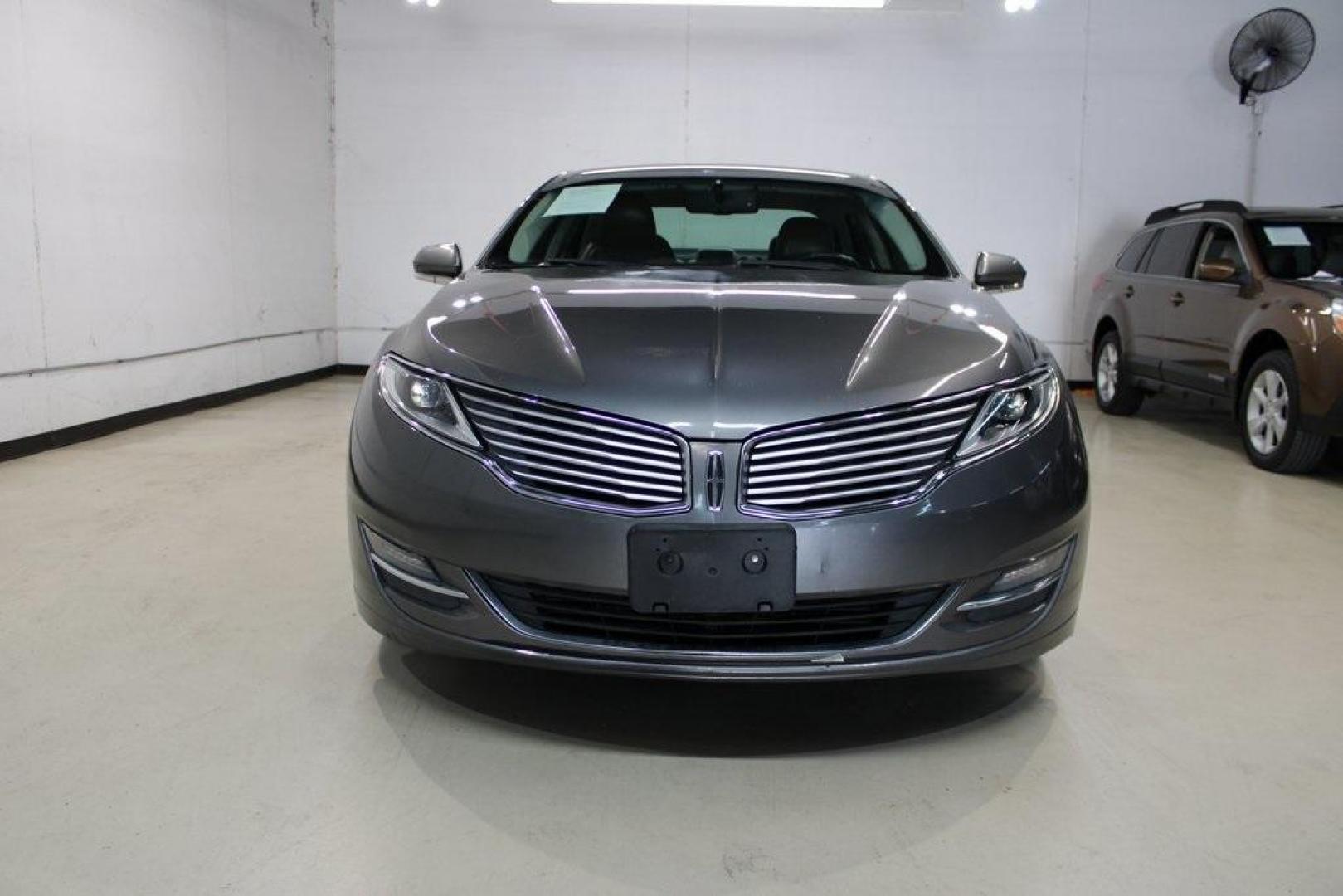 2014 Sterling Gray Metallic /Hazelnut Lincoln MKZ Hybrid (3LN6L2LUXER) with an 2.0L I4 Atkinson-Cycle iVCT engine, CVT transmission, located at 15300 Midway Rd., Addison, TX, 75001, (972) 702-0011, 32.958321, -96.838074 - Photo#3