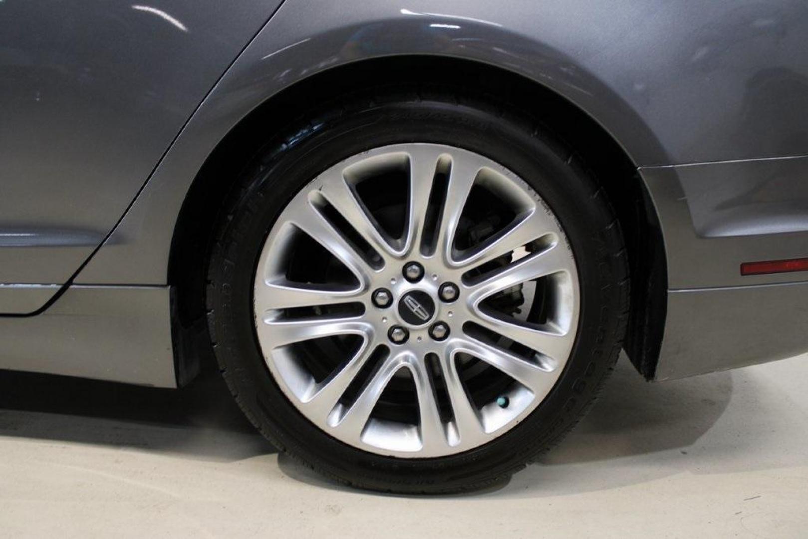 2014 Sterling Gray Metallic /Hazelnut Lincoln MKZ Hybrid (3LN6L2LUXER) with an 2.0L I4 Atkinson-Cycle iVCT engine, CVT transmission, located at 15300 Midway Rd., Addison, TX, 75001, (972) 702-0011, 32.958321, -96.838074 - Photo#5