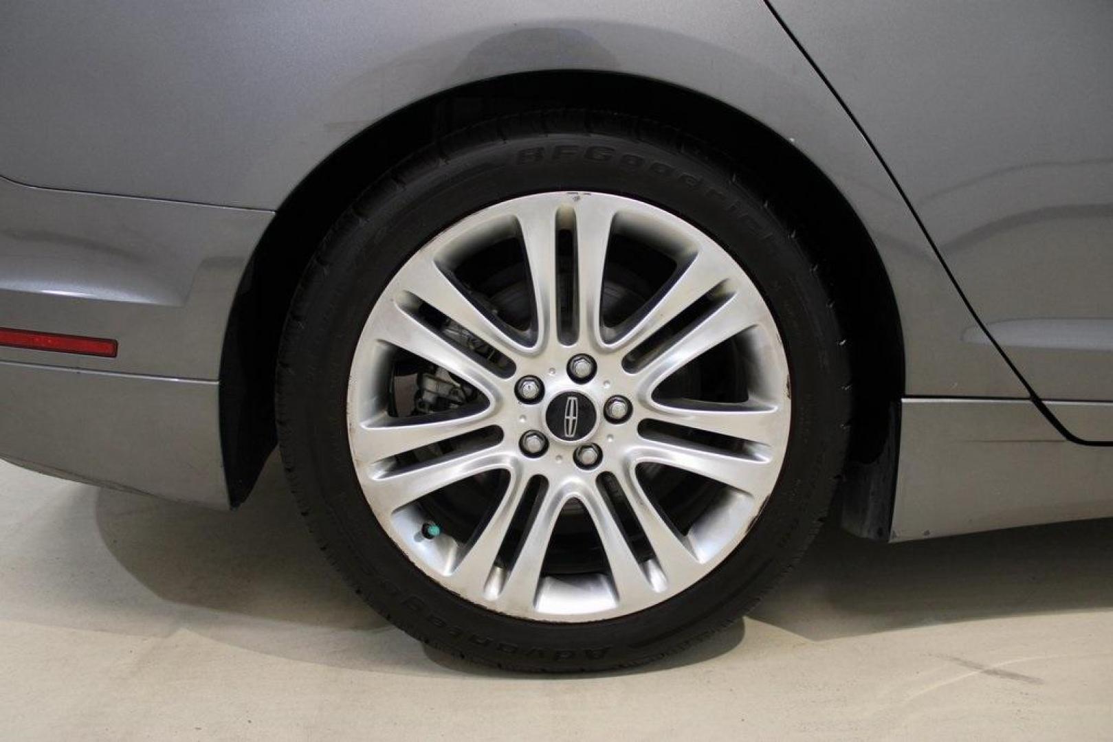 2014 Sterling Gray Metallic /Hazelnut Lincoln MKZ Hybrid (3LN6L2LUXER) with an 2.0L I4 Atkinson-Cycle iVCT engine, CVT transmission, located at 15300 Midway Rd., Addison, TX, 75001, (972) 702-0011, 32.958321, -96.838074 - Photo#6