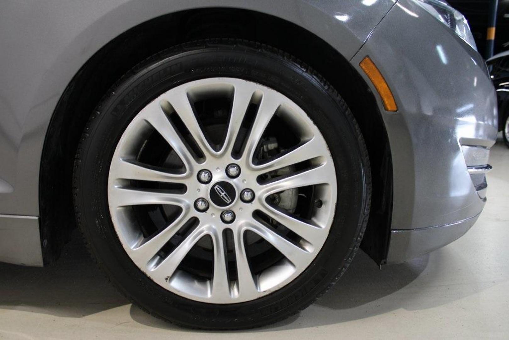 2014 Sterling Gray Metallic /Hazelnut Lincoln MKZ Hybrid (3LN6L2LUXER) with an 2.0L I4 Atkinson-Cycle iVCT engine, CVT transmission, located at 15300 Midway Rd., Addison, TX, 75001, (972) 702-0011, 32.958321, -96.838074 - Photo#7