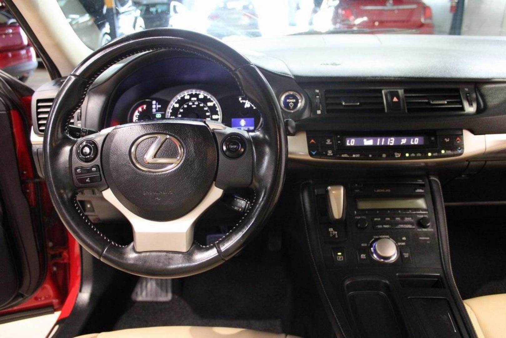 2014 Red /Flaxen Lexus CT 200h (JTHKD5BH8E2) with an 1.8L 4-Cylinder DOHC 16V VVT-i engine, CVT transmission, located at 15300 Midway Rd., Addison, TX, 75001, (972) 702-0011, 32.958321, -96.838074 - Introducing the 2014 Lexus CT 200h, now available at Midway Auto Group in Addison, Texas. This luxury compact hatchback seamlessly combines eco-friendly performance with refined styling, offering an exceptional driving experience for those who value efficiency without compromising on sophistication. - Photo#17