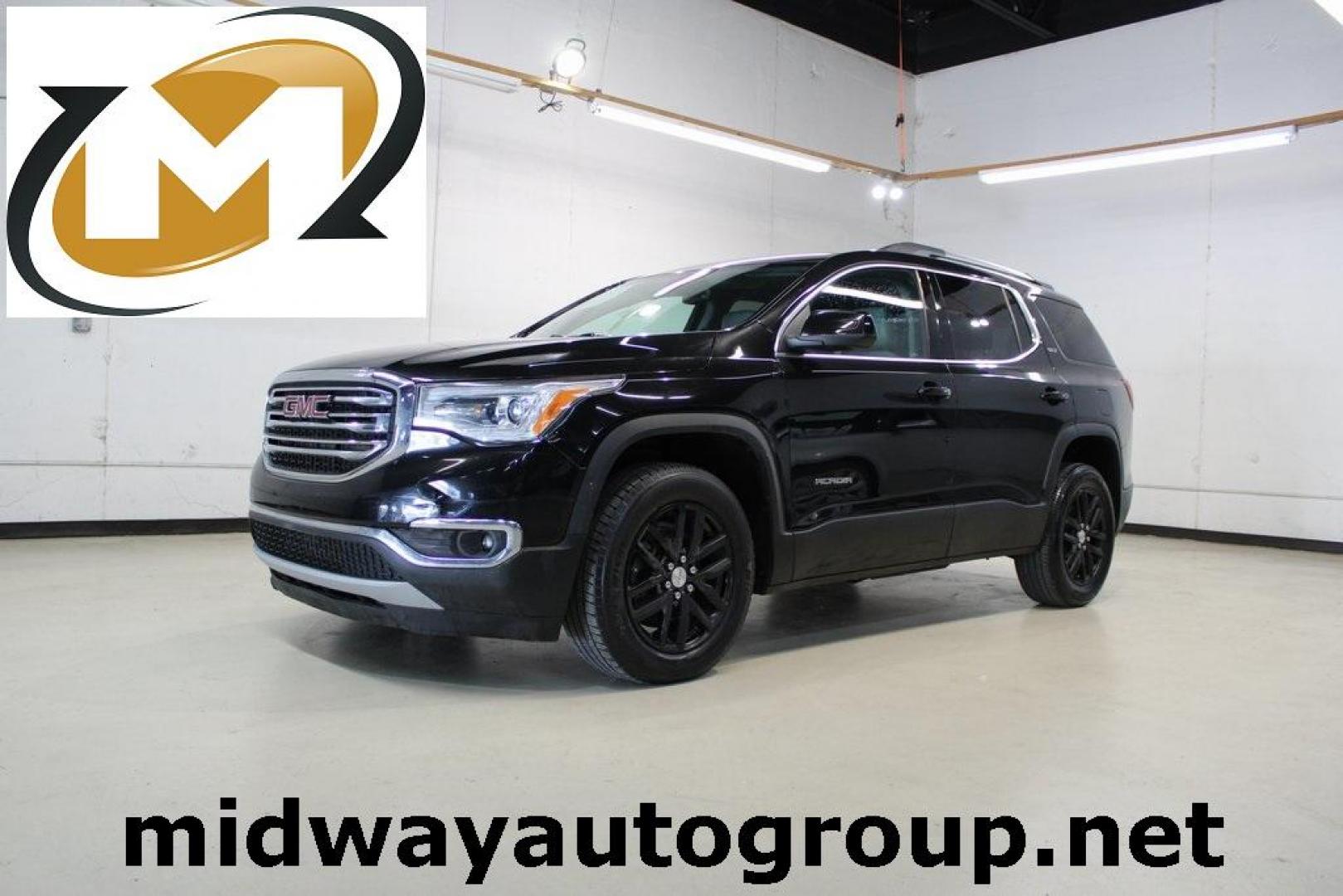 2018 Ebony Twilight Metallic /Cocoa/ Light Ash Gray GMC Acadia SLT-1 (1GKKNMLS1JZ) with an 3.6L V6 SIDI DOHC VVT engine, Automatic transmission, located at 15300 Midway Rd., Addison, TX, 75001, (972) 702-0011, 32.958321, -96.838074 - HOME OF THE NO HAGGLE PRICE - WHOLESALE PRICES TO THE PUBLIC!! Bluetooth, Hands Free Connectivity, Navigation, Premium Audio, 3rd Row Seat, Backup Camera, Leather Seats, Premium Wheels, Sunroof / Moonroof, non smoker, Acadia SLT-1, 4D Sport Utility, 3.6L V6 SIDI DOHC VVT, 6-Speed Automatic, FWD, Ebo - Photo#0